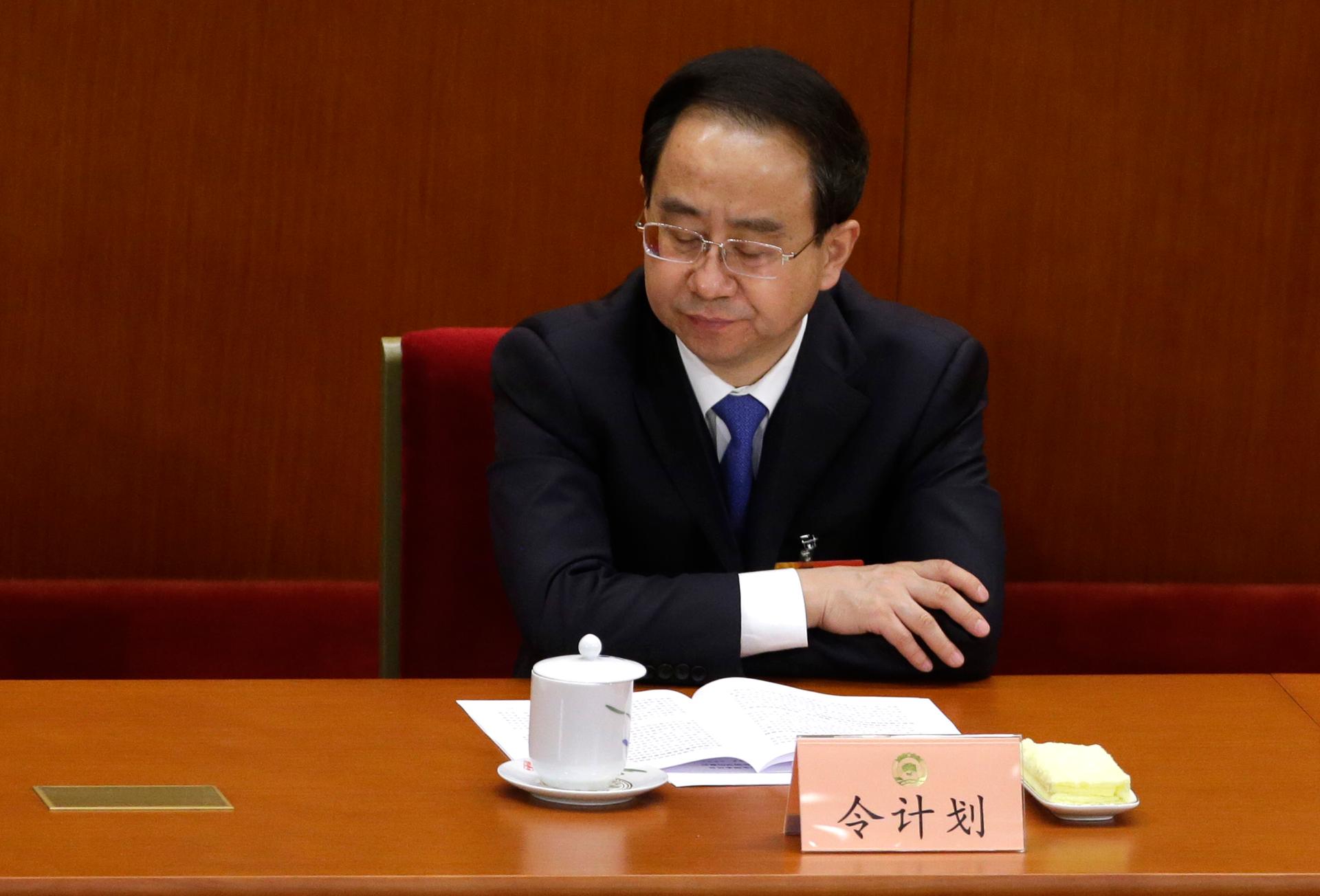 Ling Jihua, newly elected vice chairman of the Chinese People's Political Consultative Conference (CPPCC), pauses while attending the opening ceremony of the CPPCC at the Great Hall of the People in Beijing March 3, 2013.  