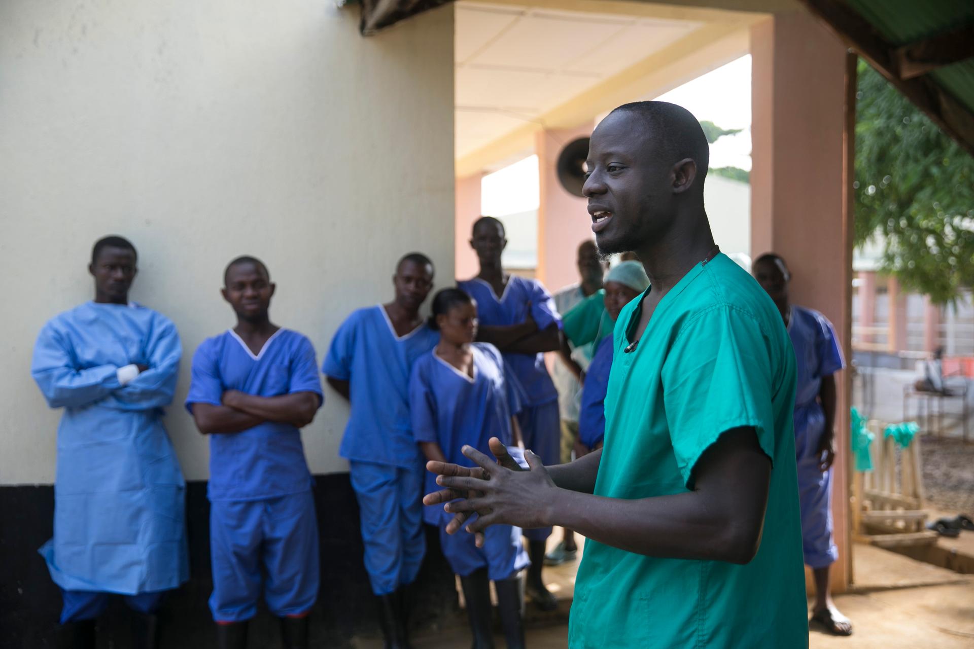 Healthcare workers were some of the hardest hit during Sierra Leone's Ebola epidemic. The names of 200 of those who died will be read at a vigil in Freetown. (Photo of hospital staff in Freetown at the height of the outbreak). 