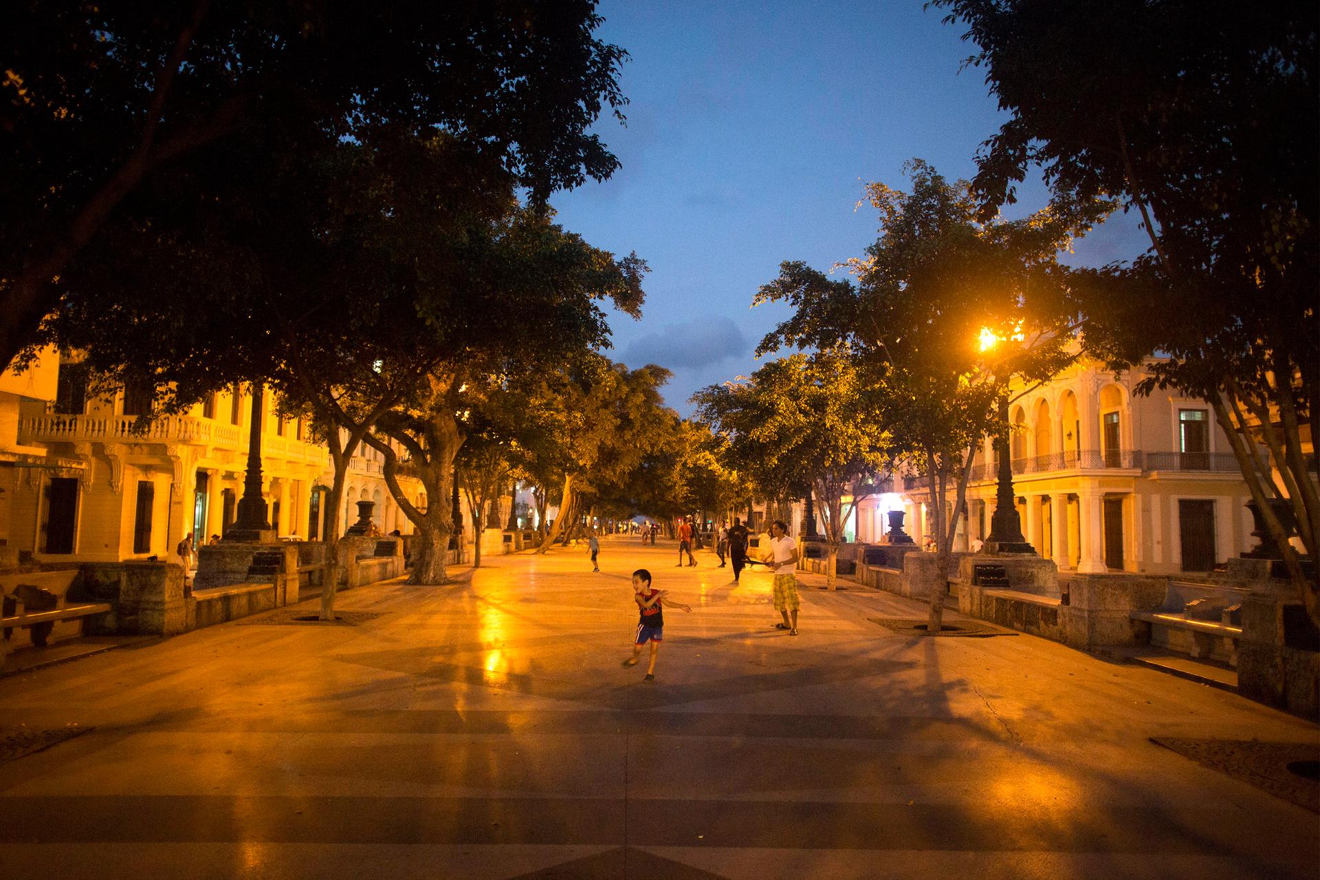 A child plays at the Prado Boulevard in downtown Havana.