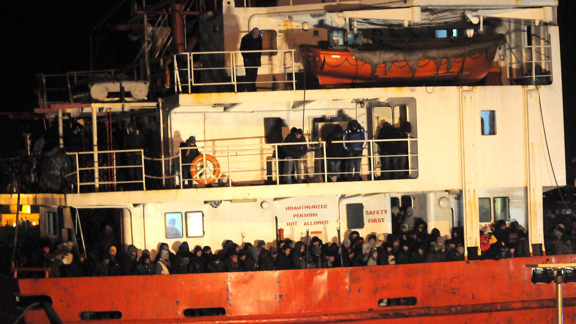 A ship called Blue Sky M docking in southern Italy on New Year’s Eve 2014 after being rescued. Locals interrupted their celebrations to help the hundreds of freezing refugees on board.