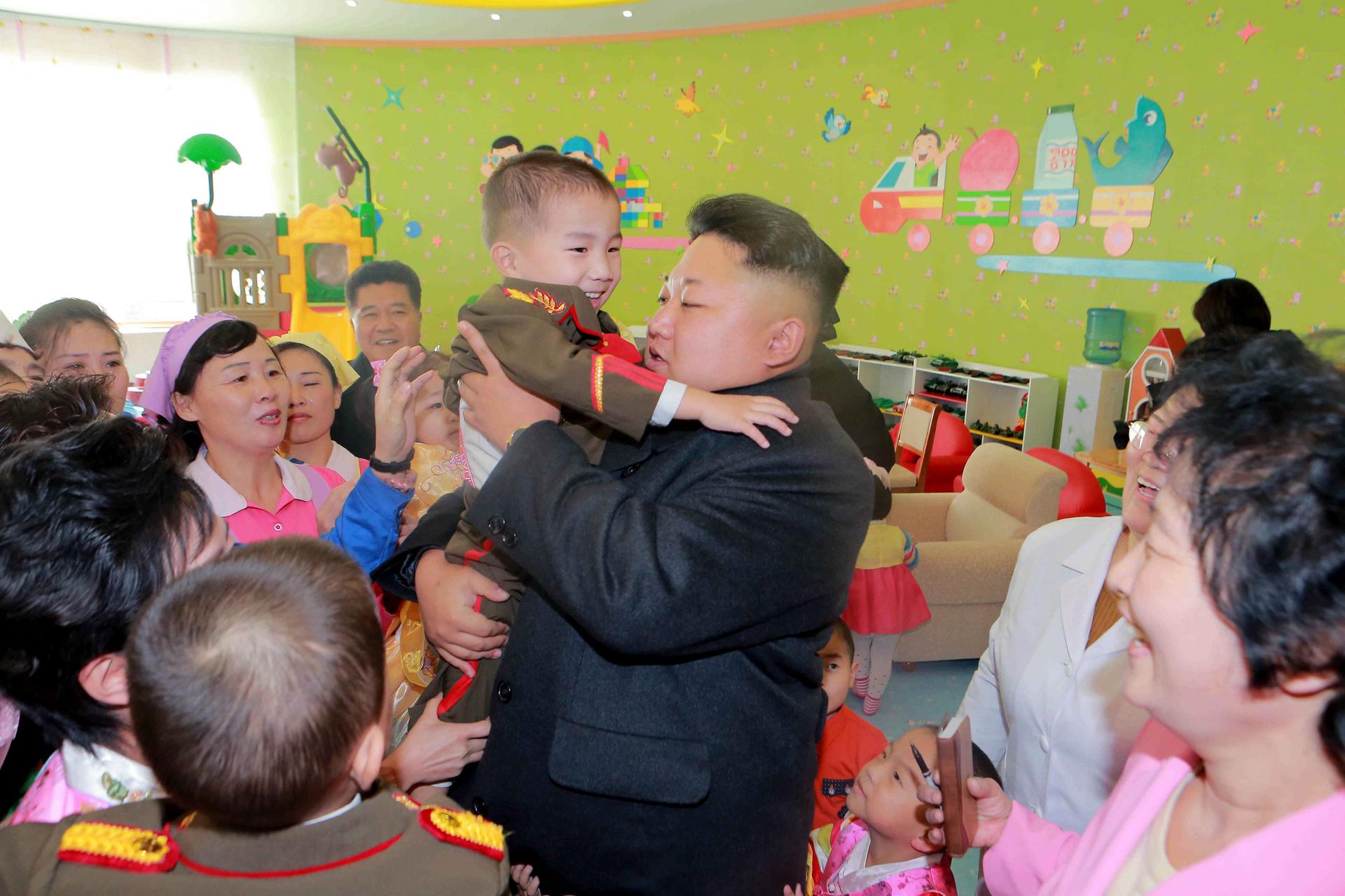 North Korean leader Kim Jong-Un visits the “Pyongyang Baby Home and Orphanage” on New Year's Day, in this photo released by the government-run Korean Central News Agency.