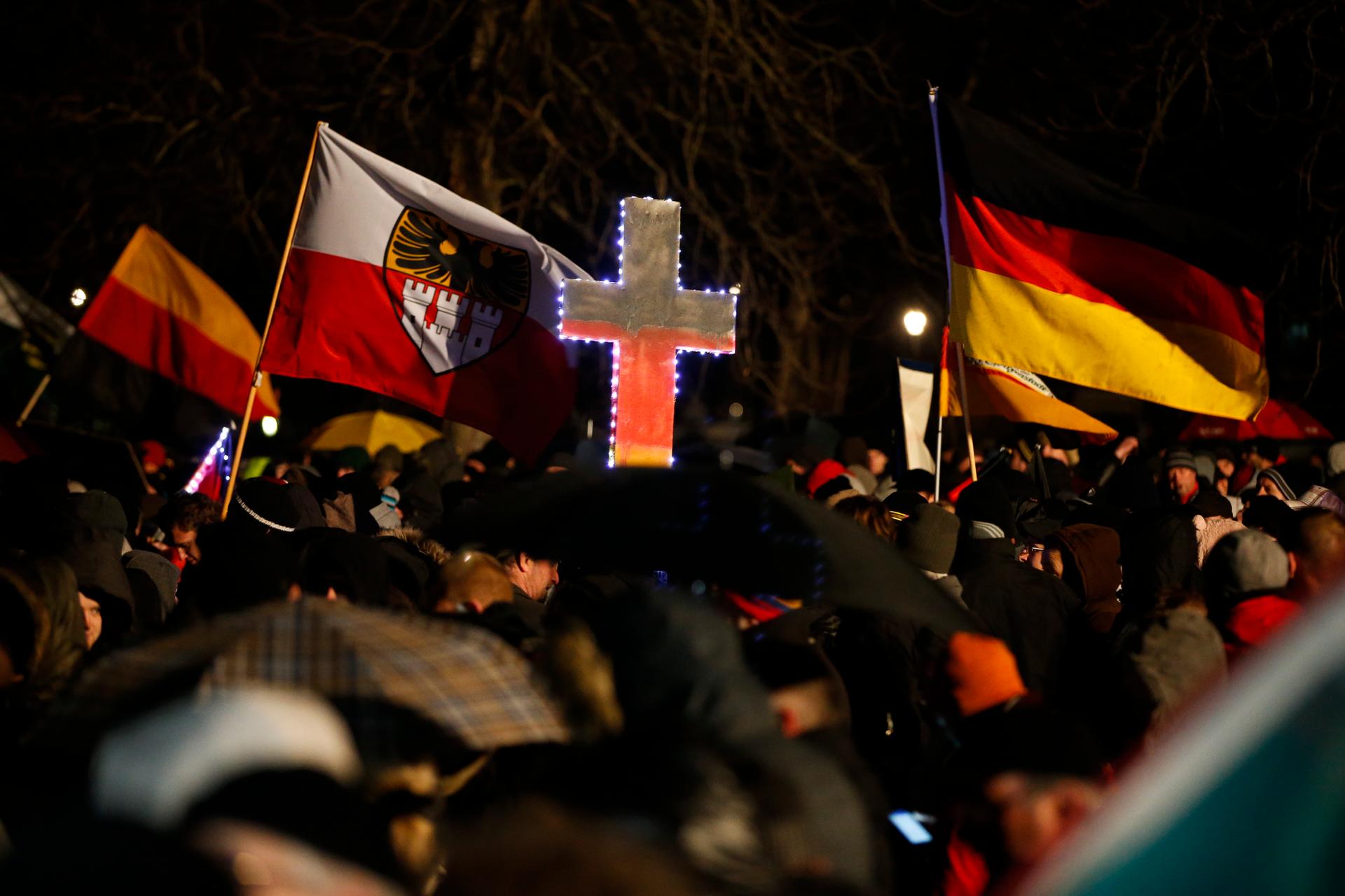 Participants take part in a demonstration called by anti-immigration group PEGIDA, a German abbreviation for "Patriotic Europeans against the Islamization of the West", in Dresden January 5, 2015. 