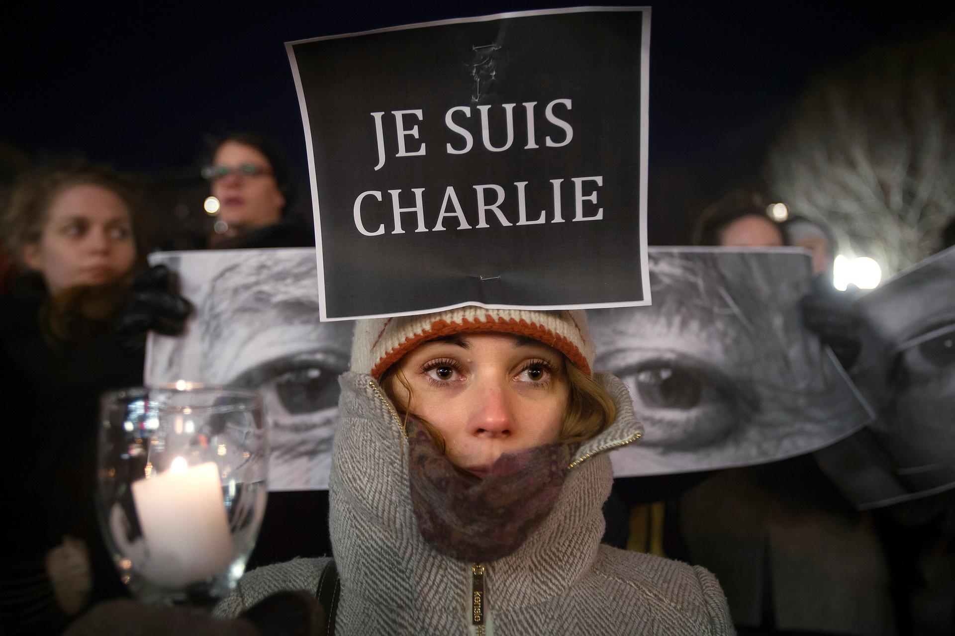 Armandine Marbach takes part in a demonstration on January 7, 2014, supporting the French publication Charlie Hebdo
