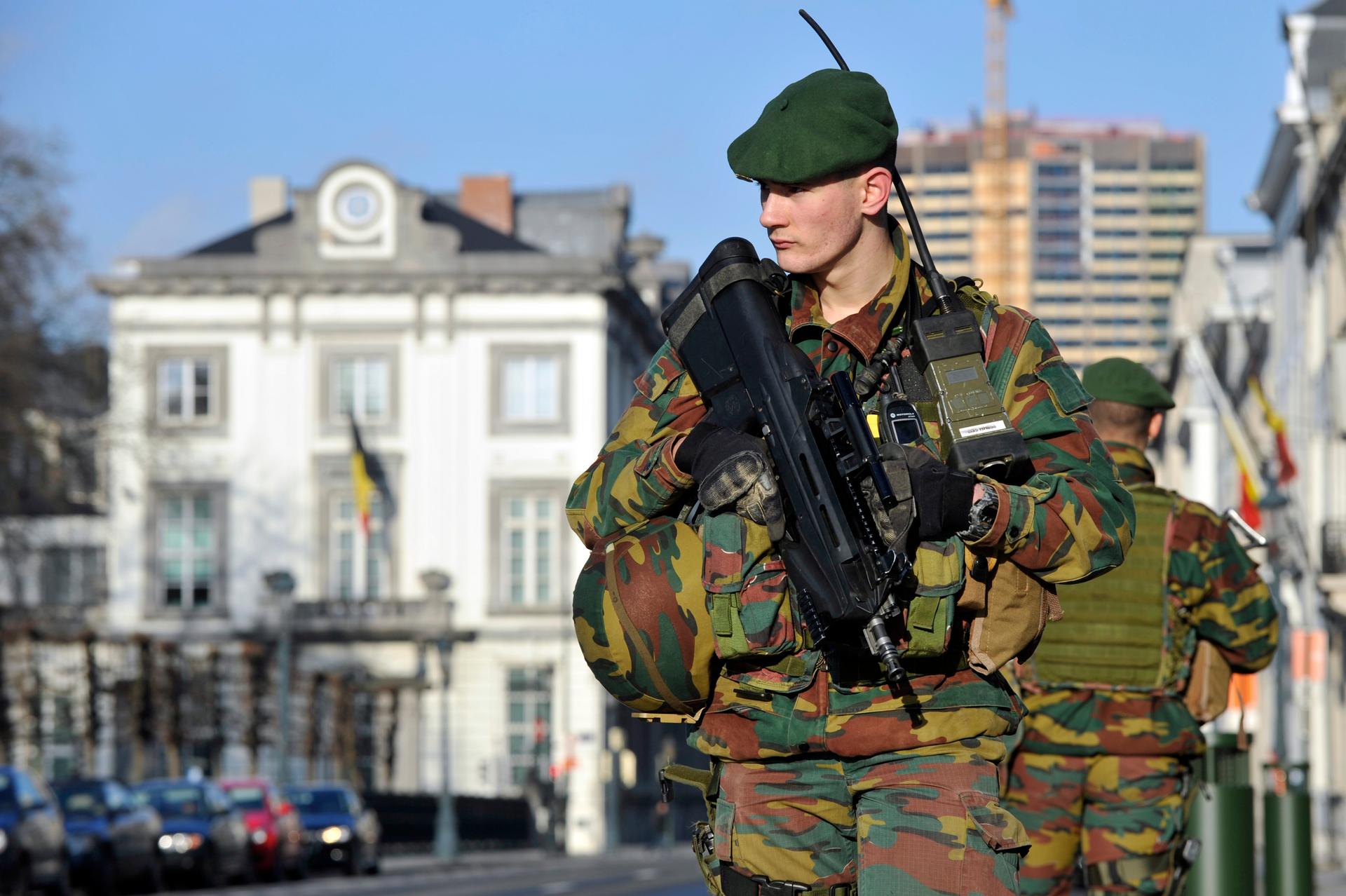Belgian soldiers patrolling outside the US Embassy in Brussels, near the Belgian Parliament. Belgium has deployed hundreds of troops to guard potential targets of terrorism, including Jewish sites and diplomatic missions.