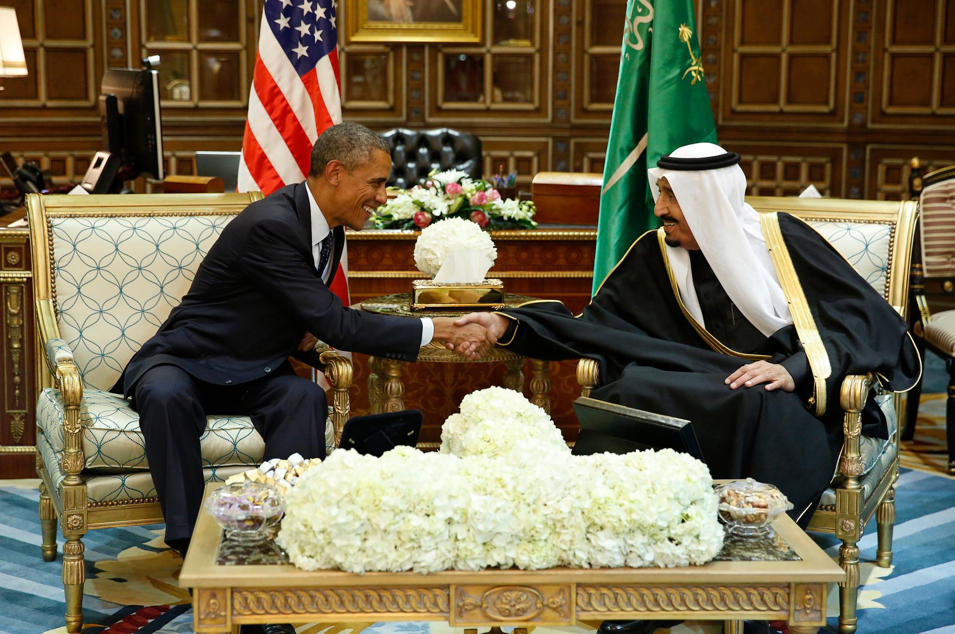 President Barack Obama shakes hands with Saudi Arabia's King Salman at the start of a meeting at Erga Palace in Riyadh.