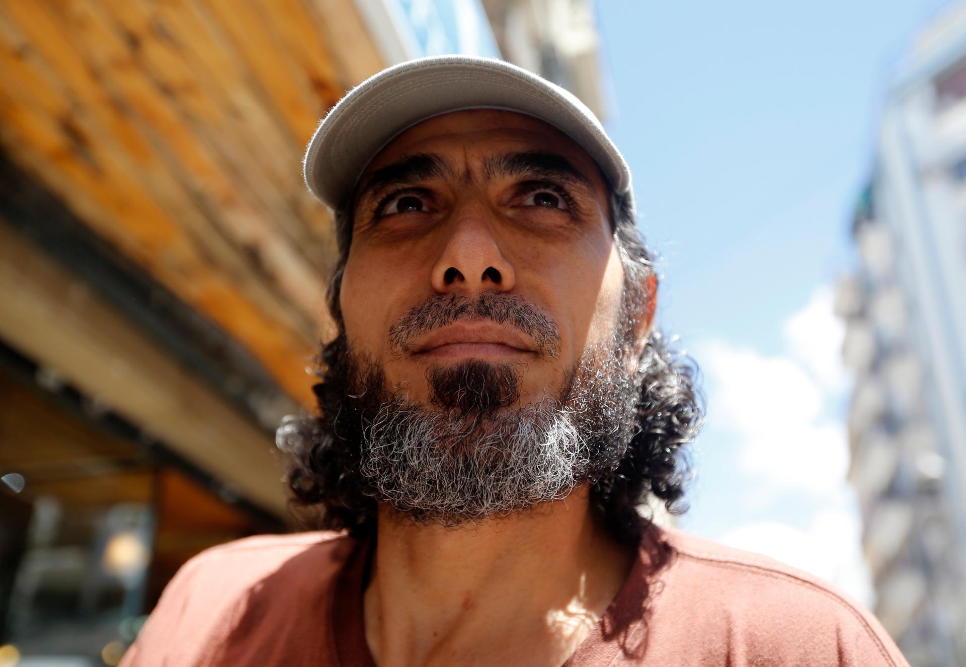 Former Guantánamo Bay detainee Abu Wa'el Dhiab looks on as he arrives for an interview in Buenos Aires on Feb. 13, 2015.
