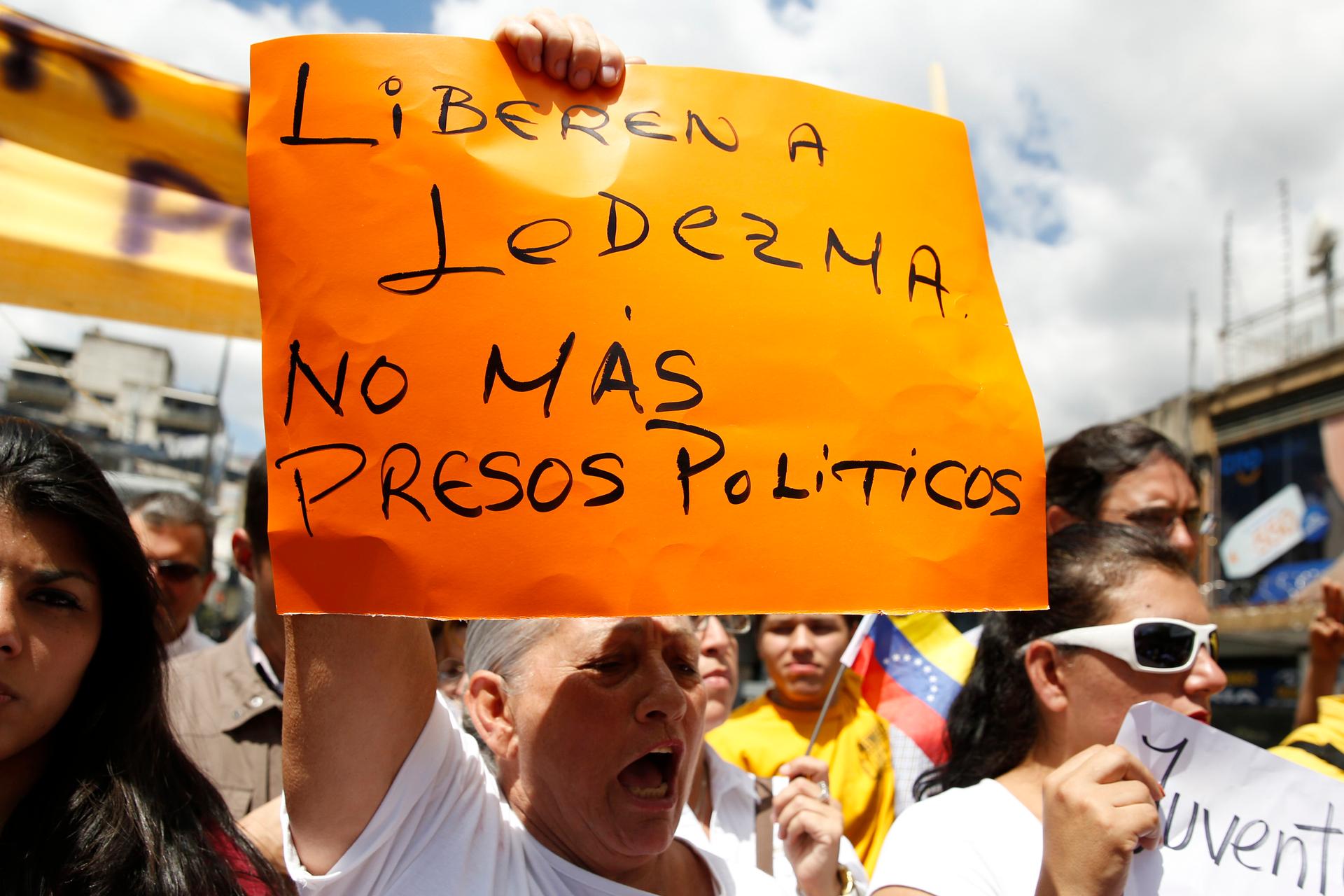 Supporters of Caracas mayor Antonio Ledezma gather to protest his arrest by President Nicolas Maduro. The banner reads: "Freedom to Ledezma. No more political prisoners". 