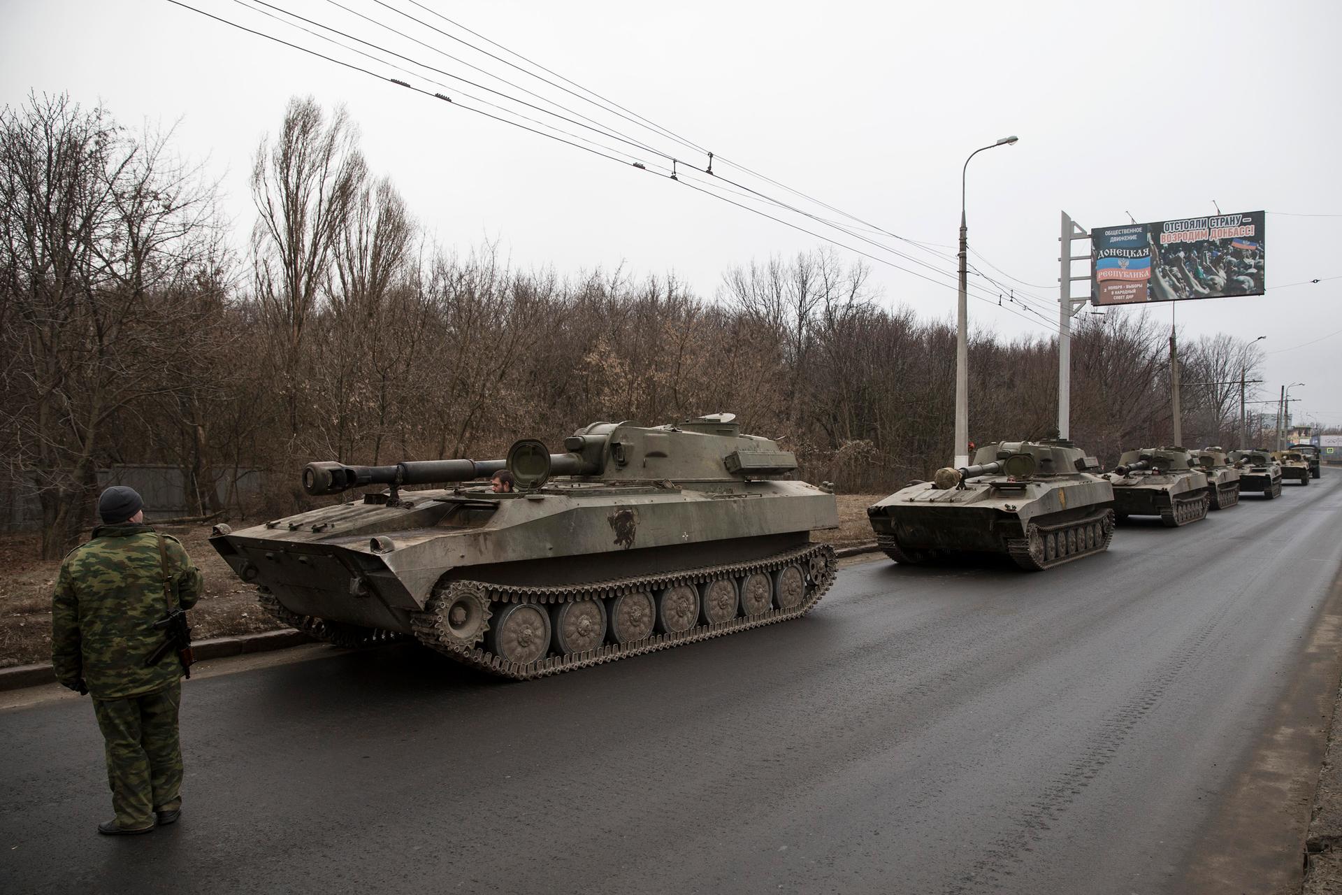A convoy of self-propelled artillery guns on the move near Donetsk on February 26, 2015. Heavy weapons like these are reported to be concentrating near Mariupol.