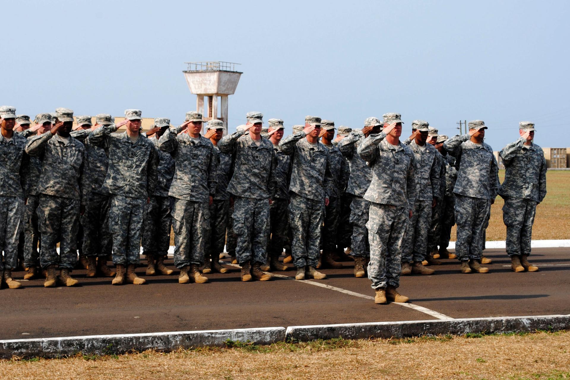 American soldiers take part in a ceremony marking the end of their mission to fight Ebola in Monrovia, Liberia, on February 26, 2015.