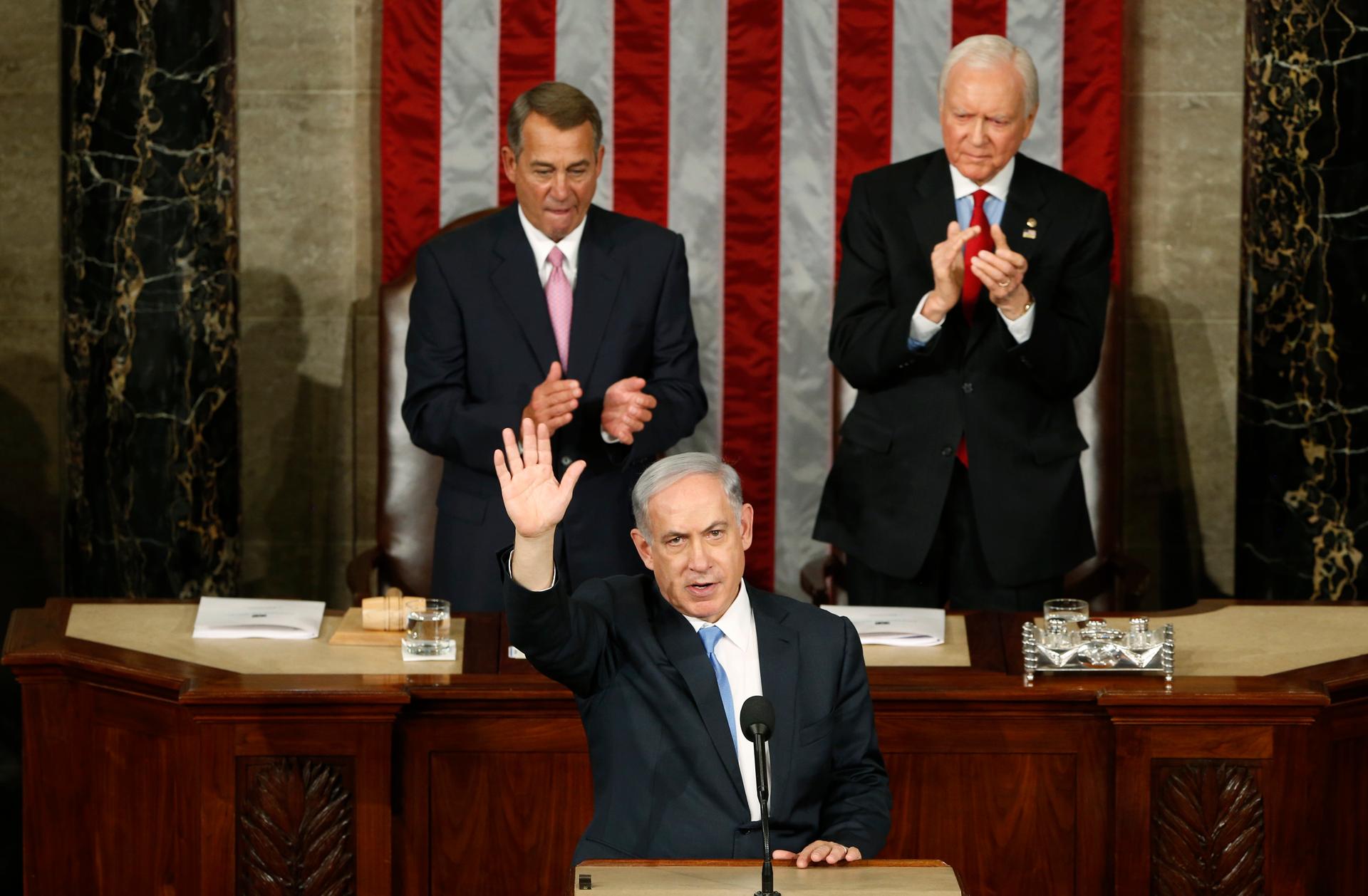 Israeli Prime Minister Benjamin Netanyahu speaks to a joint meeting of Congress on March 3, 2015. Speaker of the House John Boehner (R-Ohio) and President pro tempore of the Senate Orrin Hatch (R-Utah) applaud behind Netanyahu.