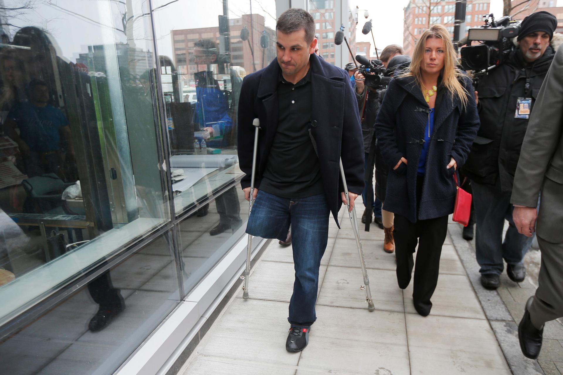 Boston Marathon bombing survivor Marc Fucarile leaves the federal courthouse in Boston on the first day of the trial of accused Boston Marathon bomber Dzhokhar Tsarnaev on March 4, 2015.