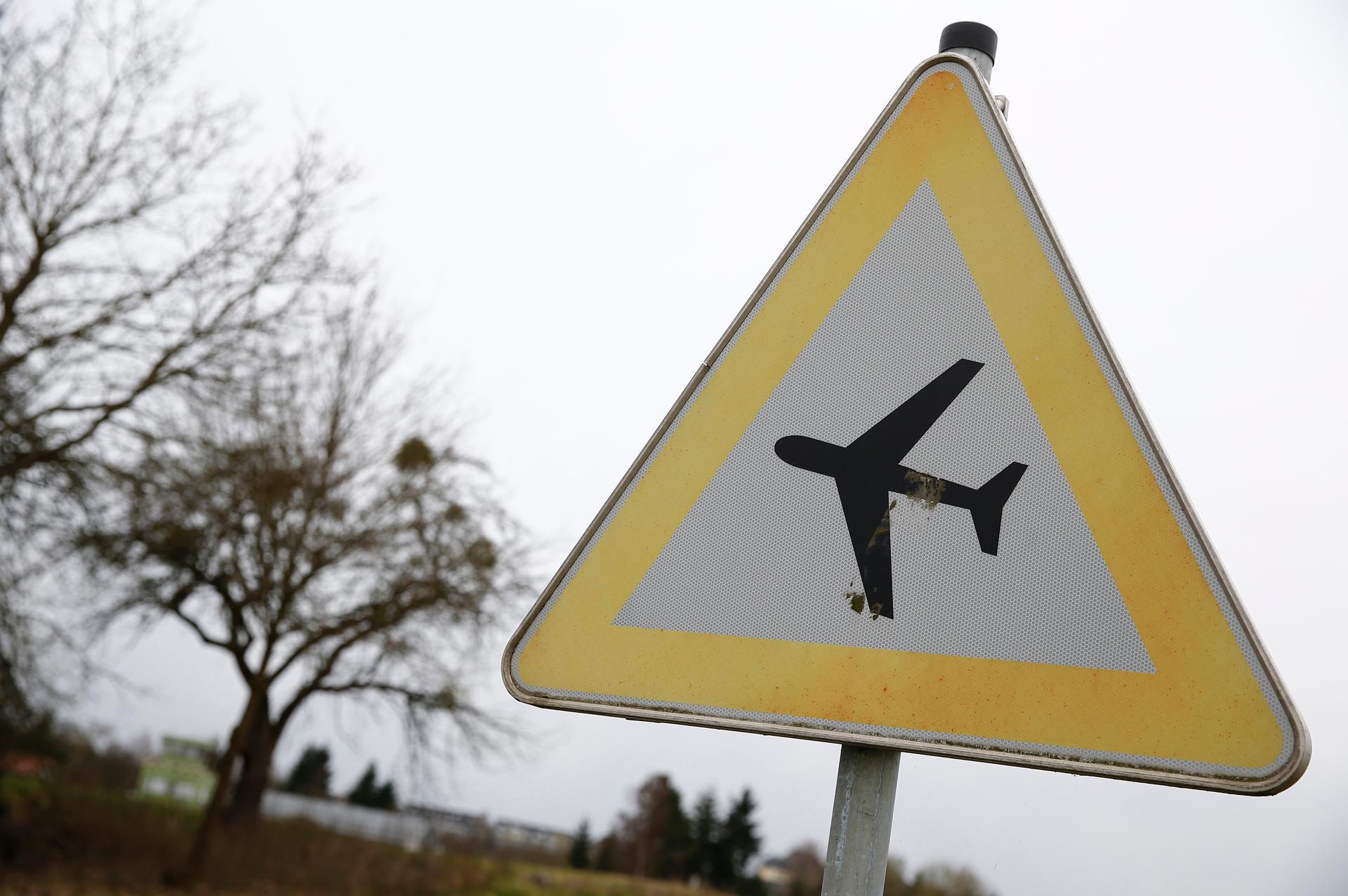 A traffic sign warning of low flying aircraft stands near to LSC Westerwald flight club, where Germanwings co-pilot Andreas Lubitz had been a member.