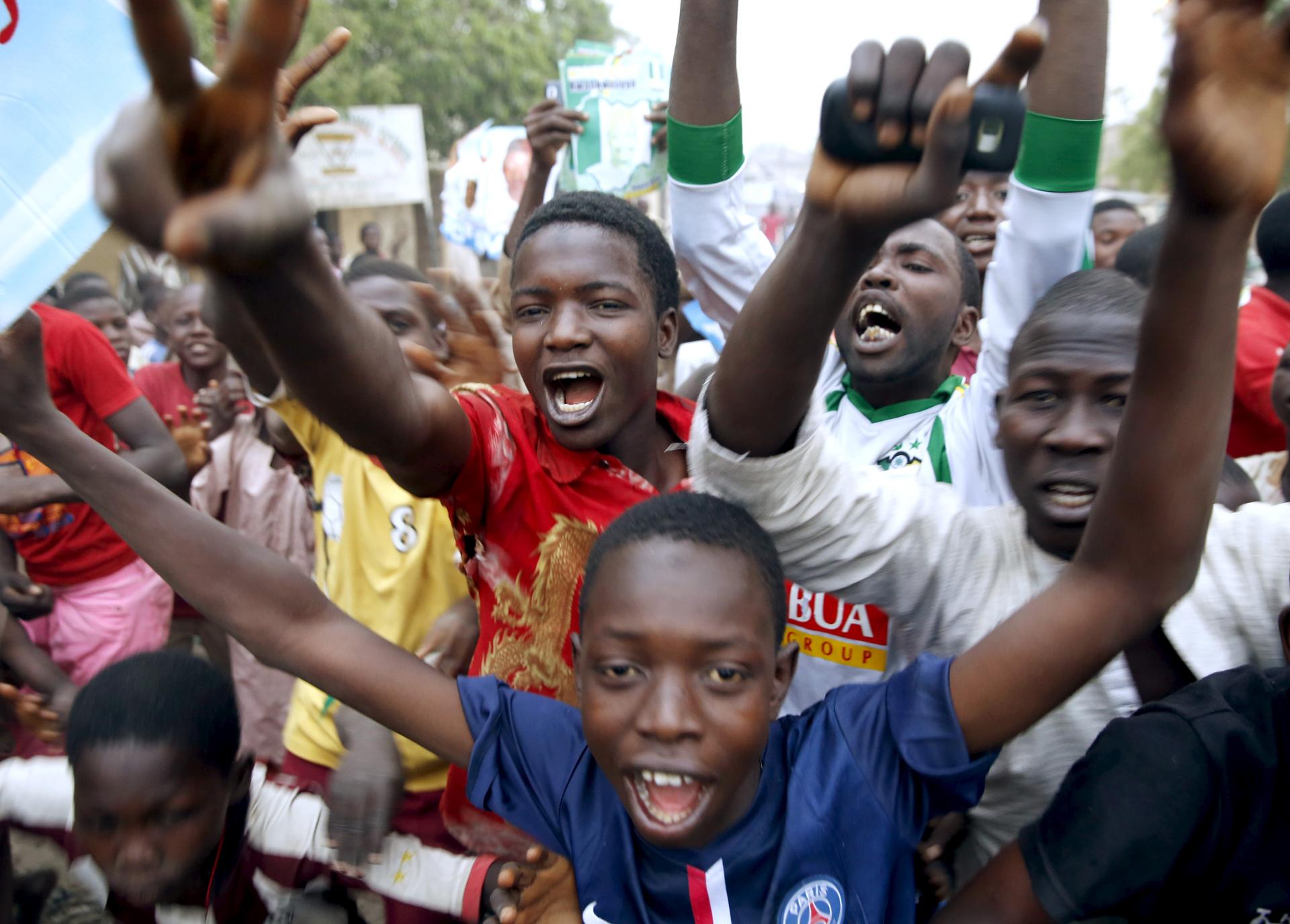 Supporters of Nigerian presidential candidate Muhammadu Buhari celebrate his election victory on March 31, 2015. Buhari is the first Nigerian to peacefully oust a sitting president under the country's democratic system.