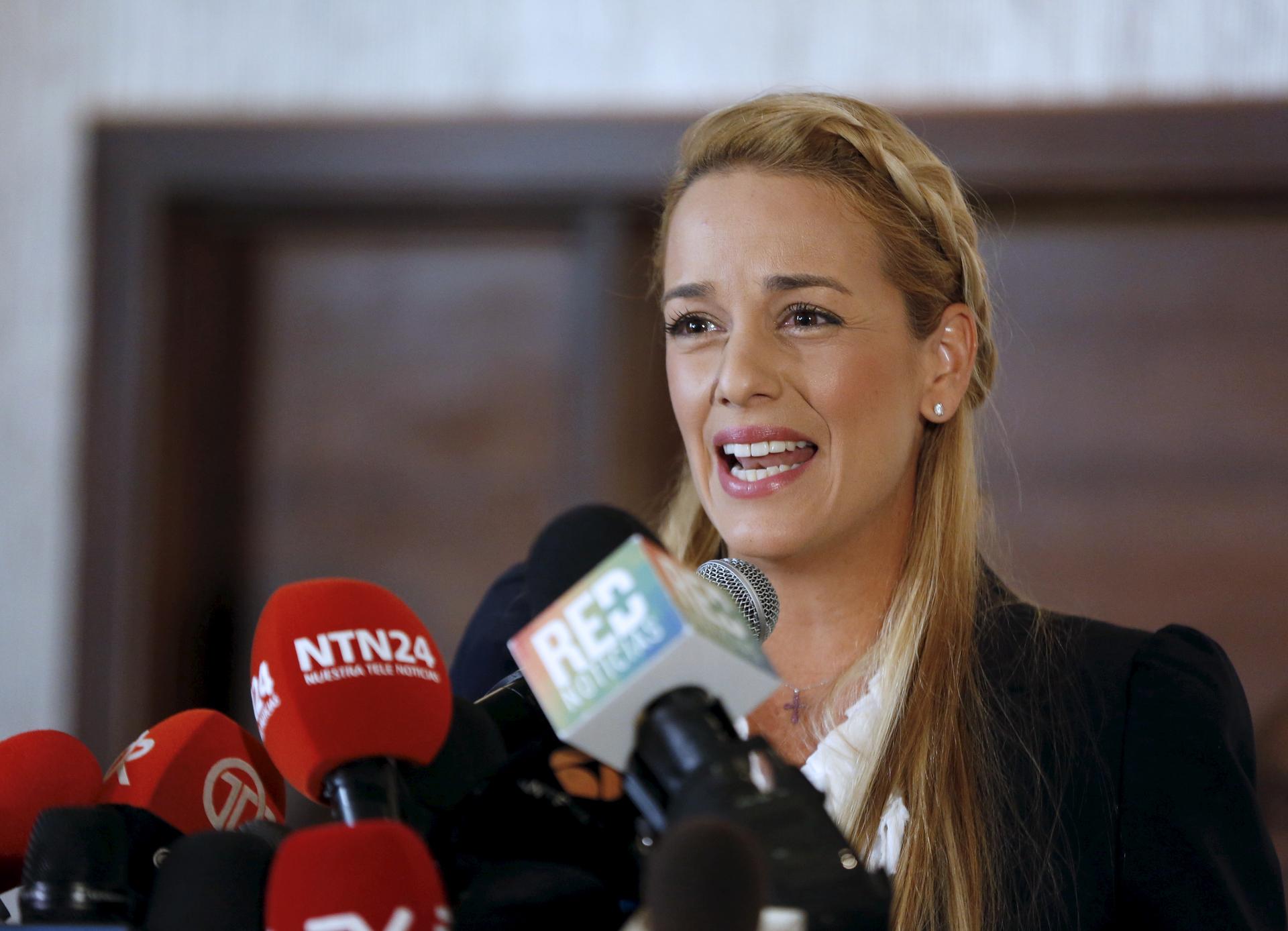 Lilian Tintori, wife of Venezuela's jailed opposition leader, Leopoldo Lopez, addresses the media during an event in support of jailed political opponents in Venezuela in Panama City on April 9, 2015.