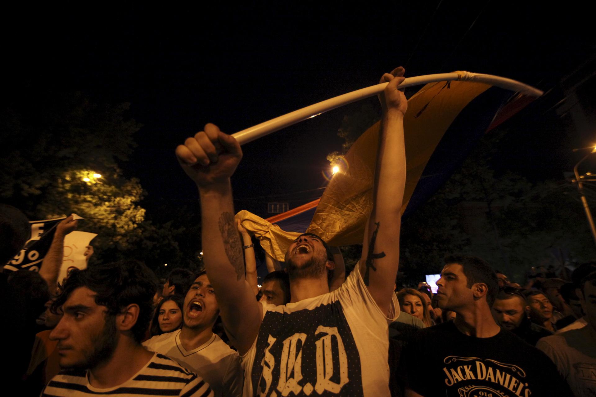 Thousands of Armenians staged a second day of protests on Tuesday in the capital Yerevan against a hike in electricity prices, defying police who used water cannon to try to disperse them.