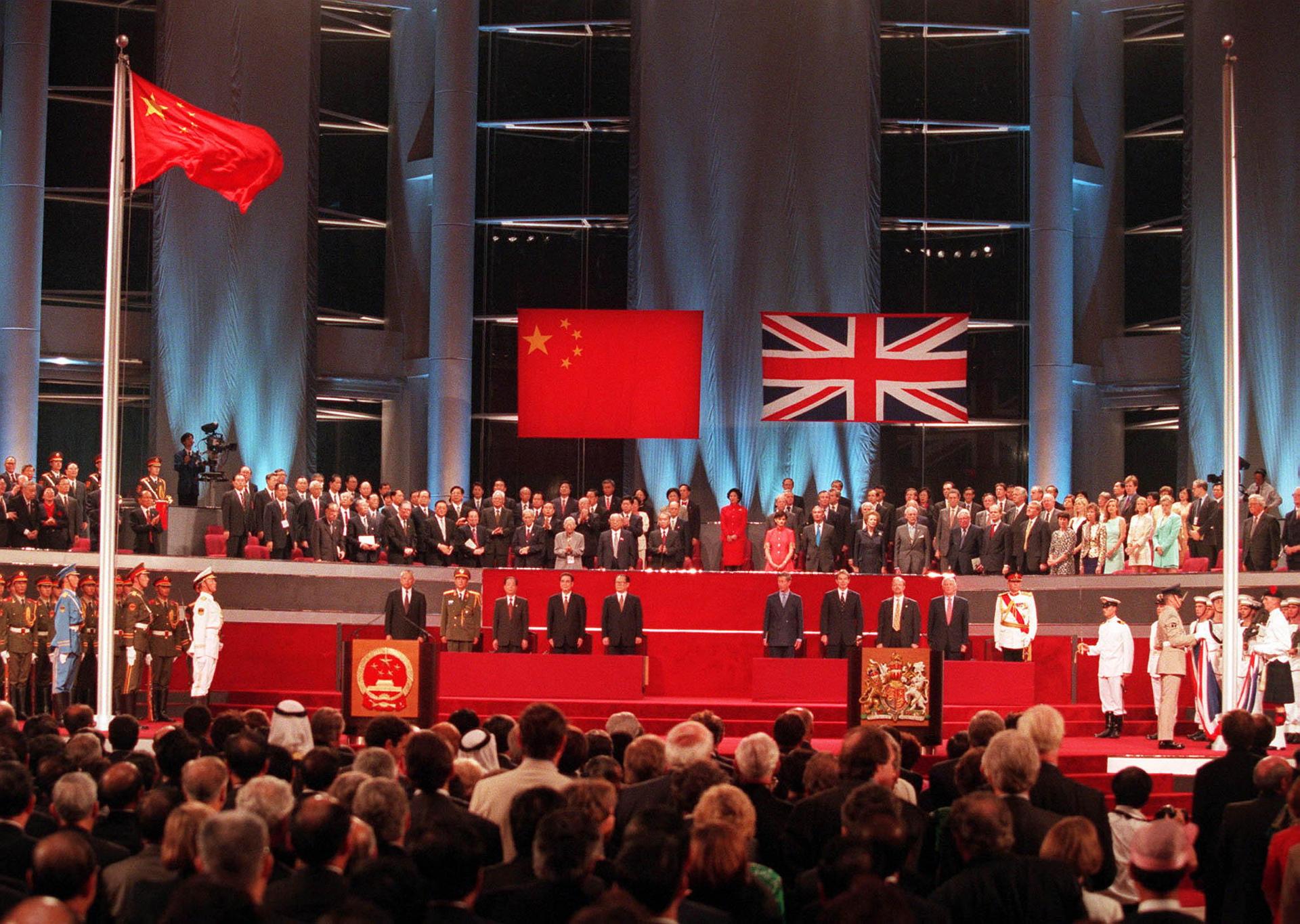 Hong Kong returned to Chinese sovereignty after 156 years of British colonial rule. The handover ceremony shows the Chinese flag flying after the Union flag was lowered on July 1, 1997.