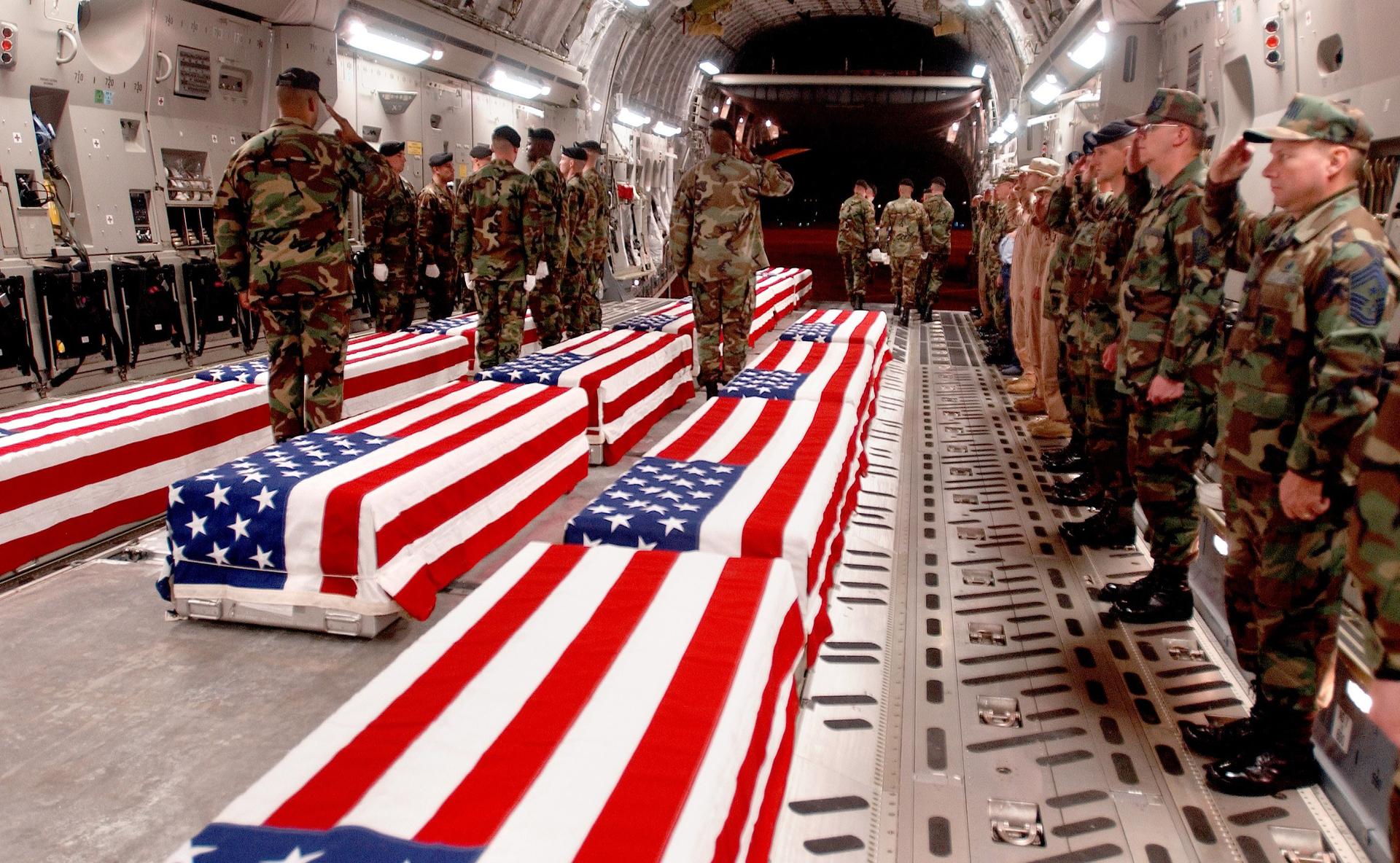 Coffins of US military personnel are prepared to be offloaded at Dover Air Force Base in Dover, Delaware in this undated photo. From 1991 to 2009, the government did not permit photographing the return of servicemembers killed in action.
