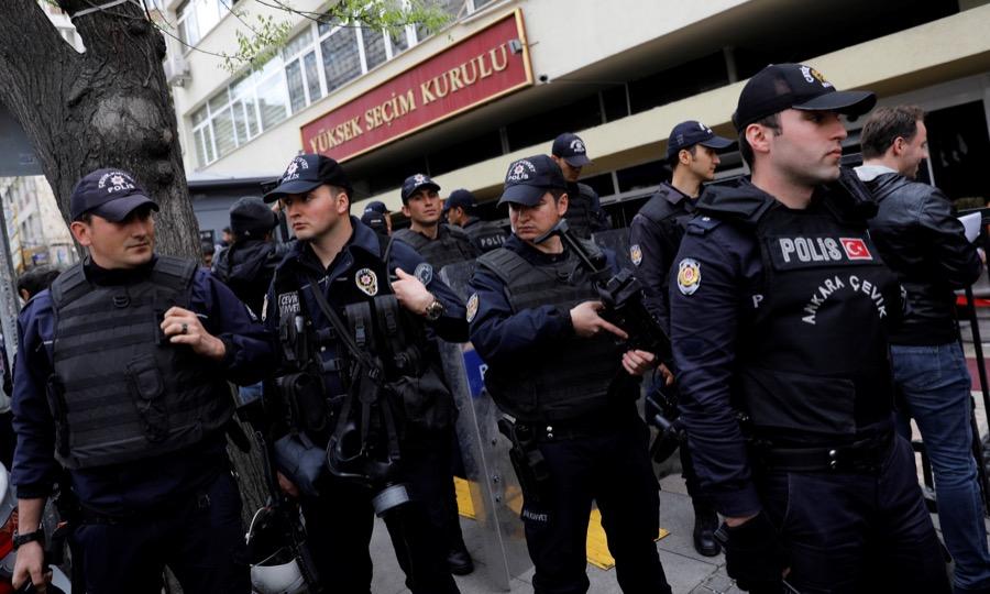 Riot police secure the entrance of the High Electoral Board in Ankara, Turkey