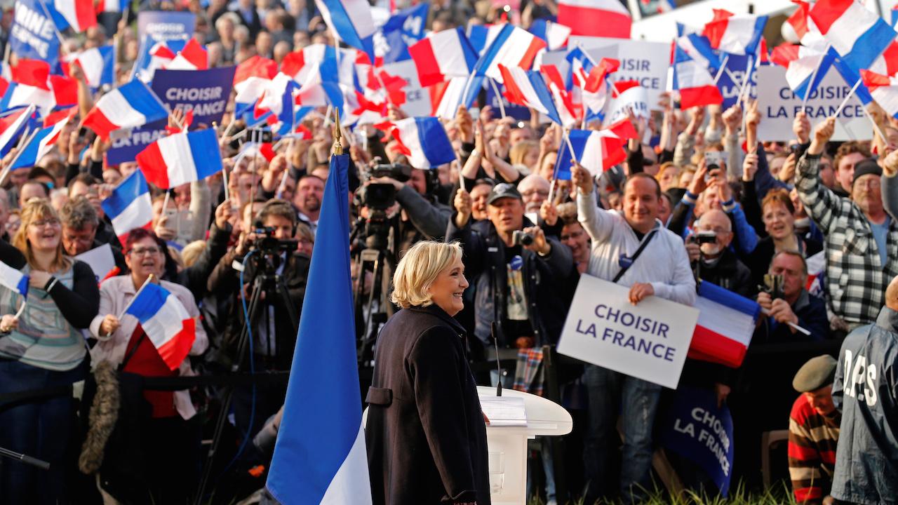 Le Pen attends a rally in Ennemain
