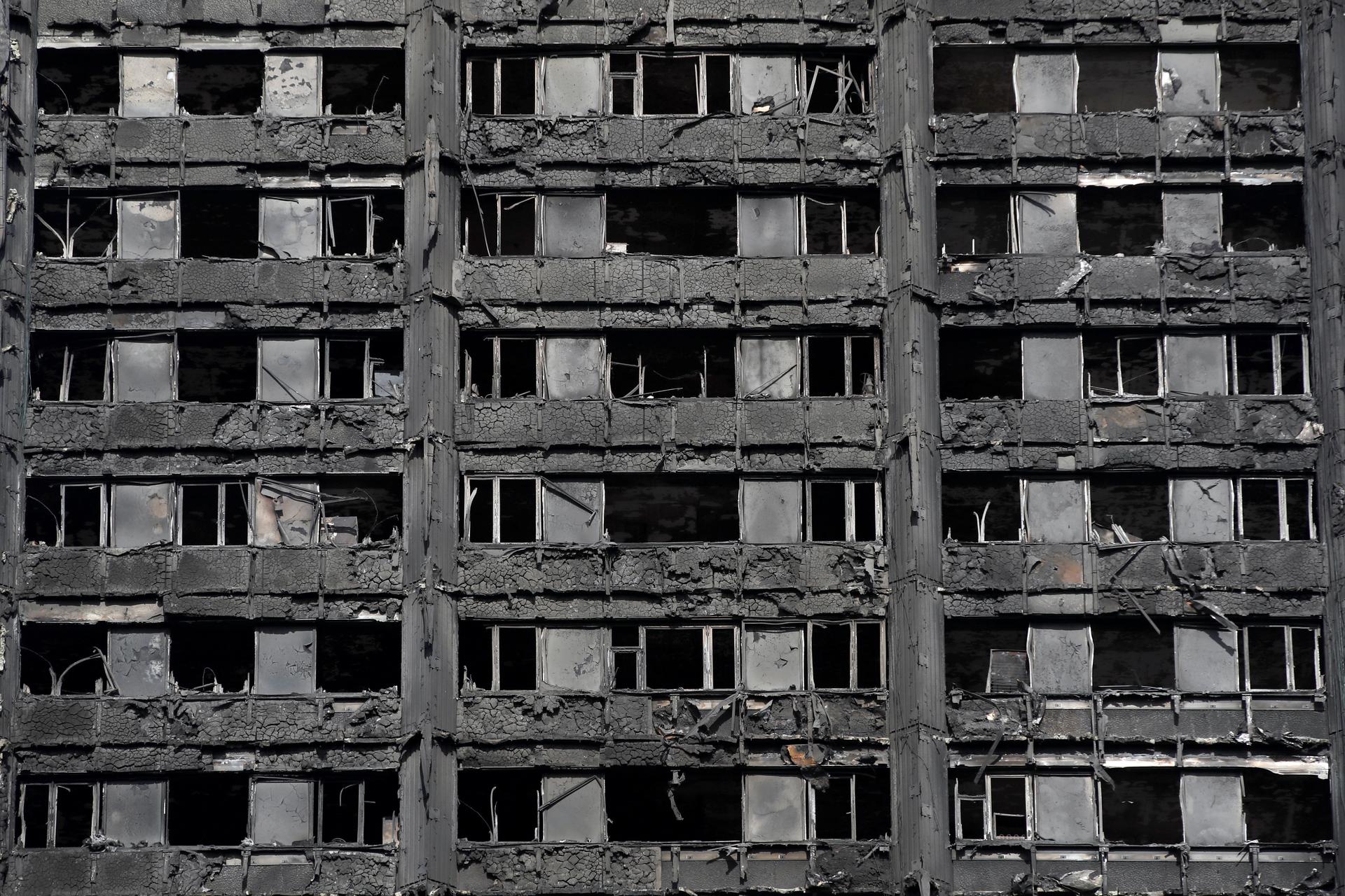 Extensive damage is seen to the Grenfell Tower block which was destroyed in a fire disaster, in north Kensington, West London.