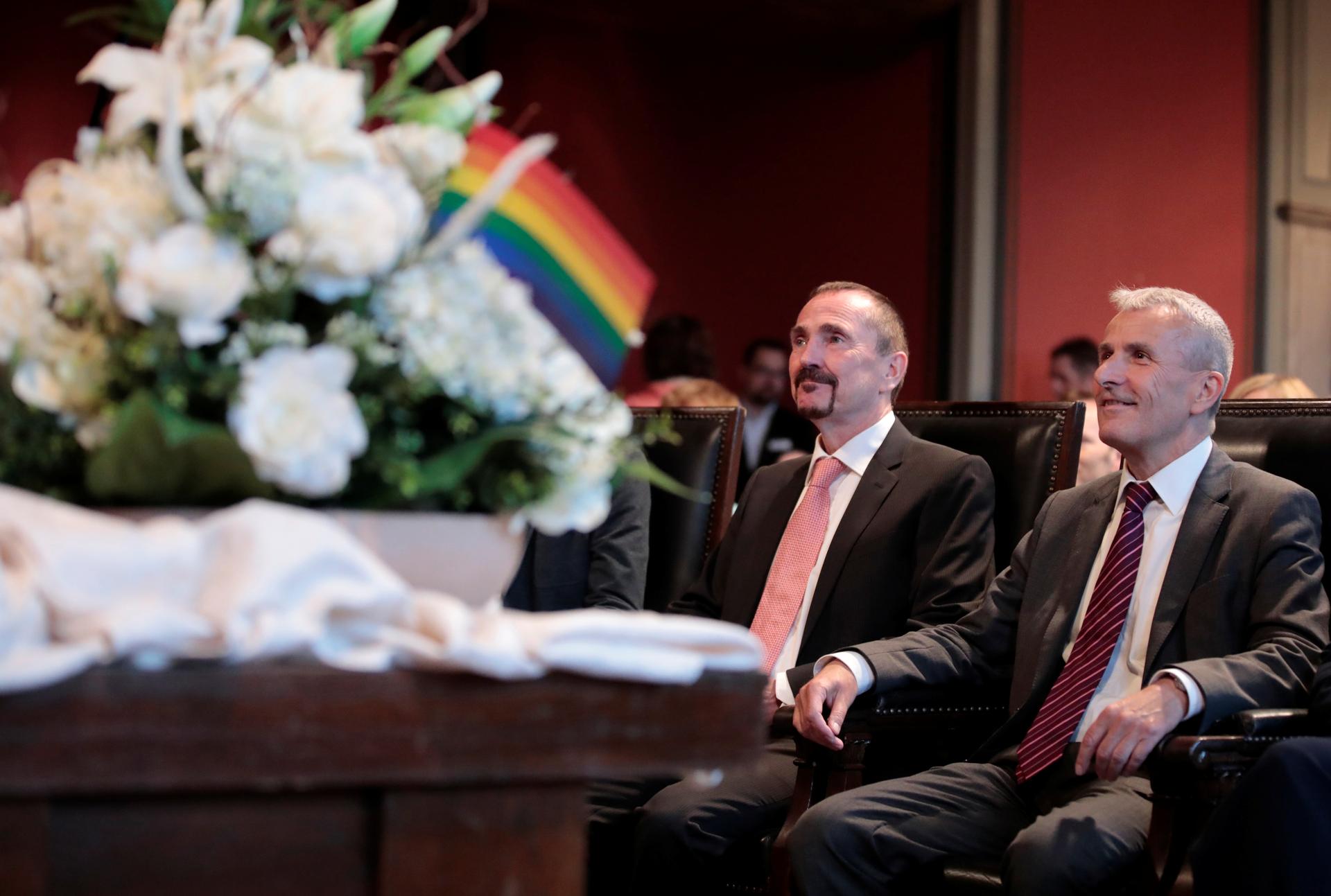 Same-sex couple Karl Kreil and Bodo Mende get married at a civil registry office, becoming Germany's first married gay couple