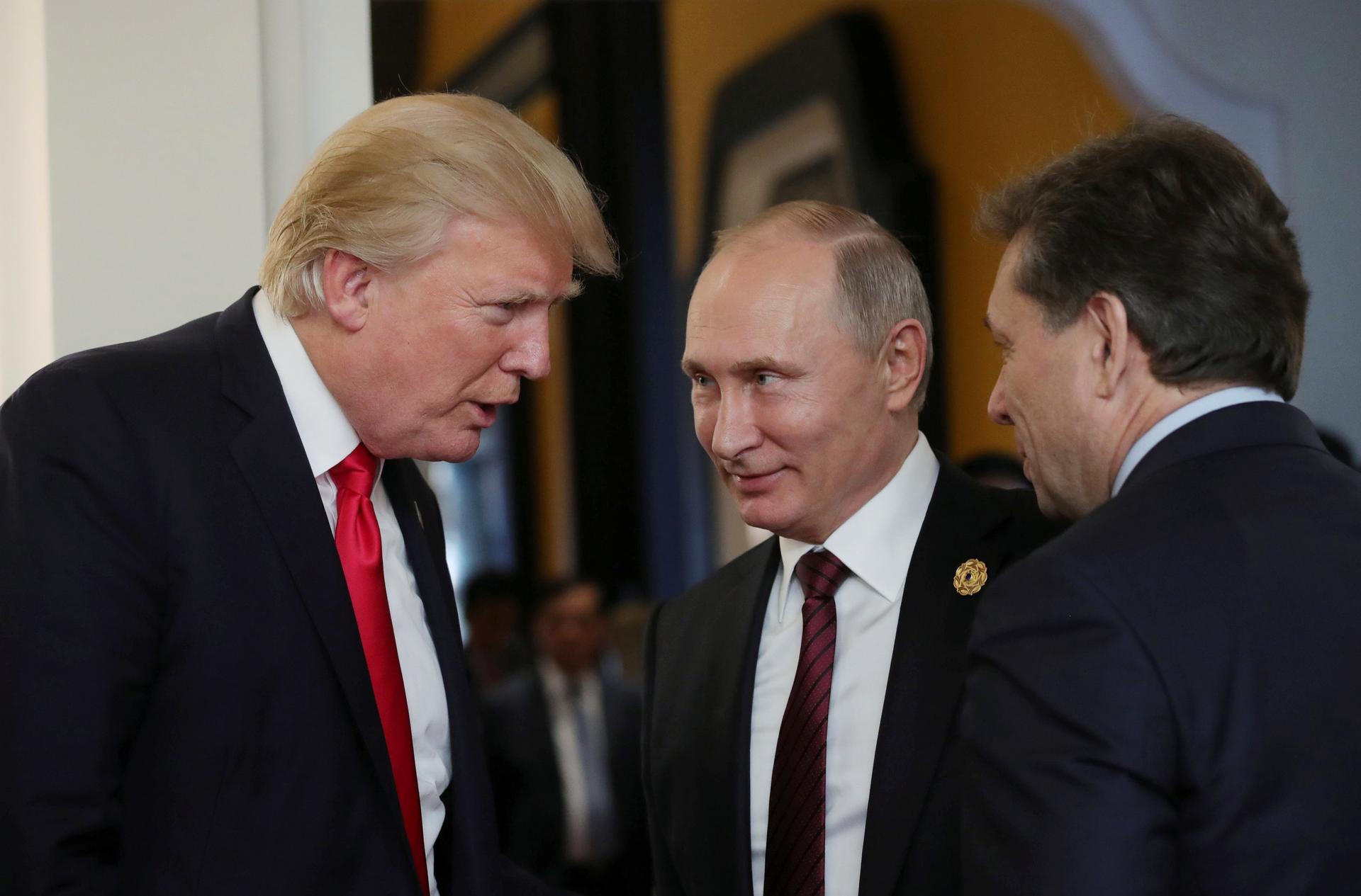 US President Donald Trump and Russian President Vladimir Putin talk