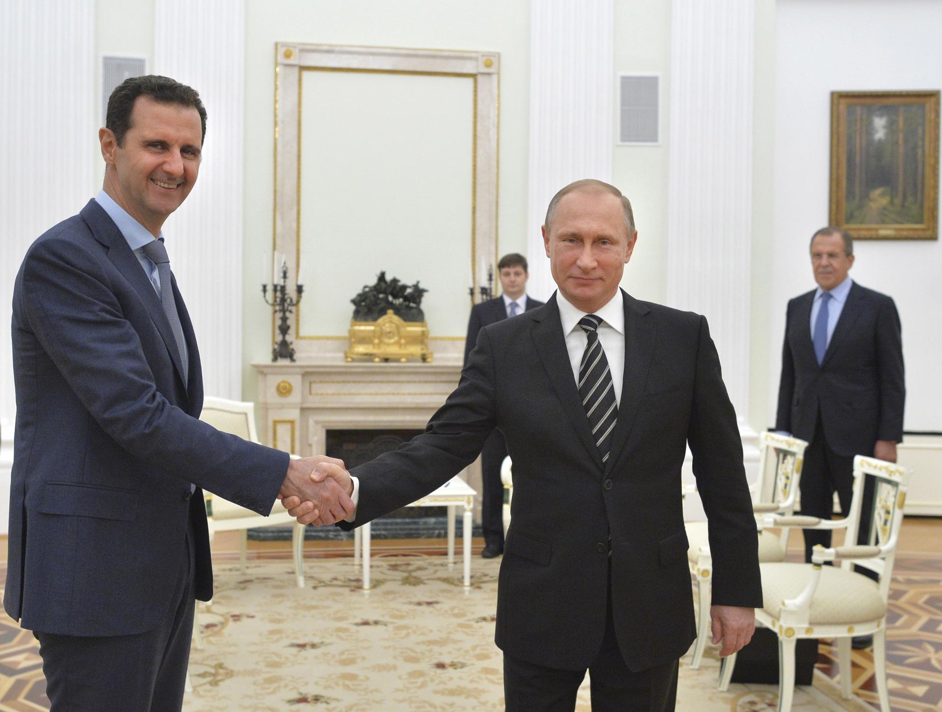 Russian President Vladimir Putin and Syrian President Bashar al-Assad meet at the Kremlin in Moscow, Russia. 