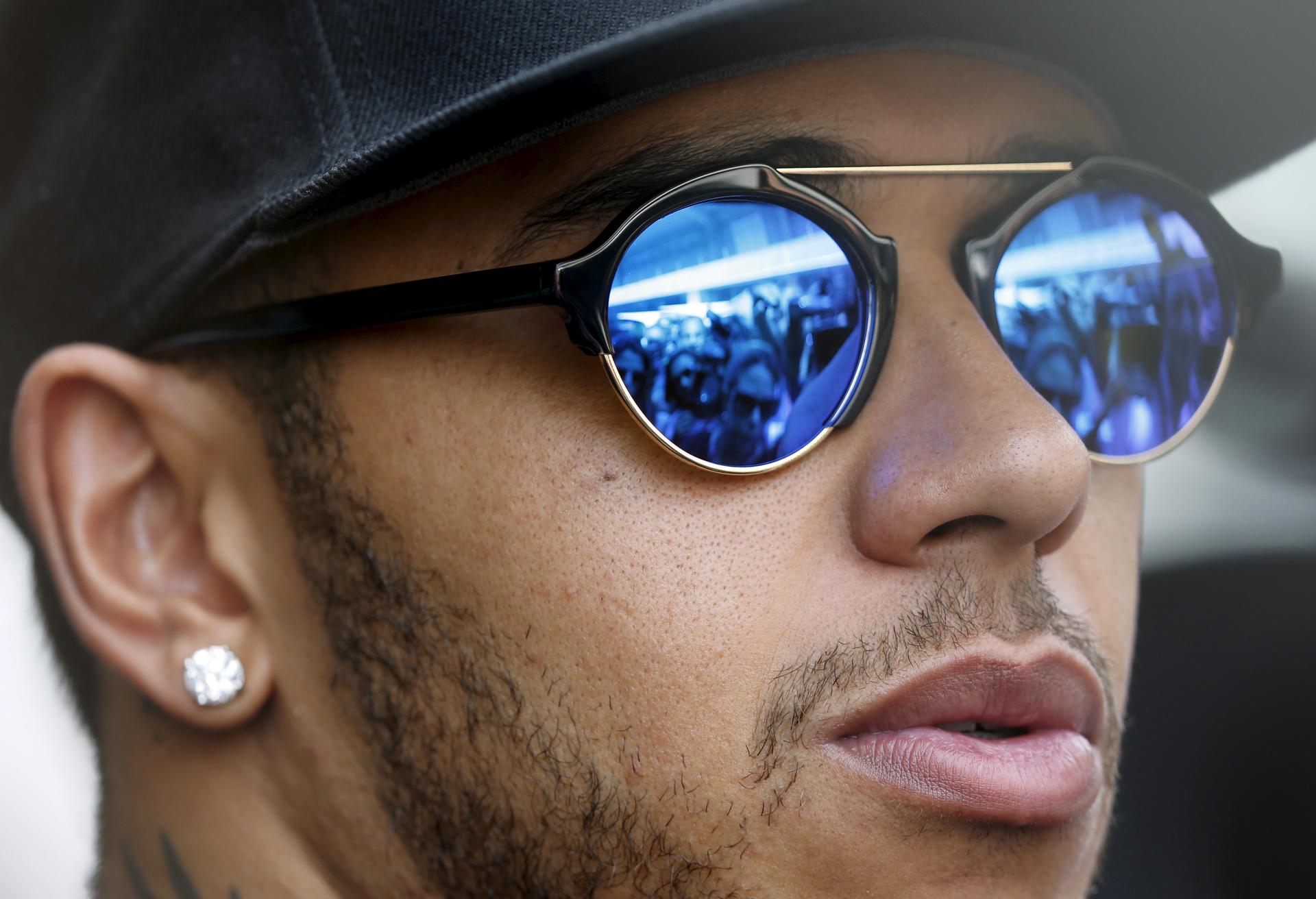 Mercedes Formula One driver Lewis Hamilton of Britain listens to a journalist's question as he attends a media conference ahead of the Brazilian F1 Grand Prix in Sao Paulo, Brazil, November 12, 2015.