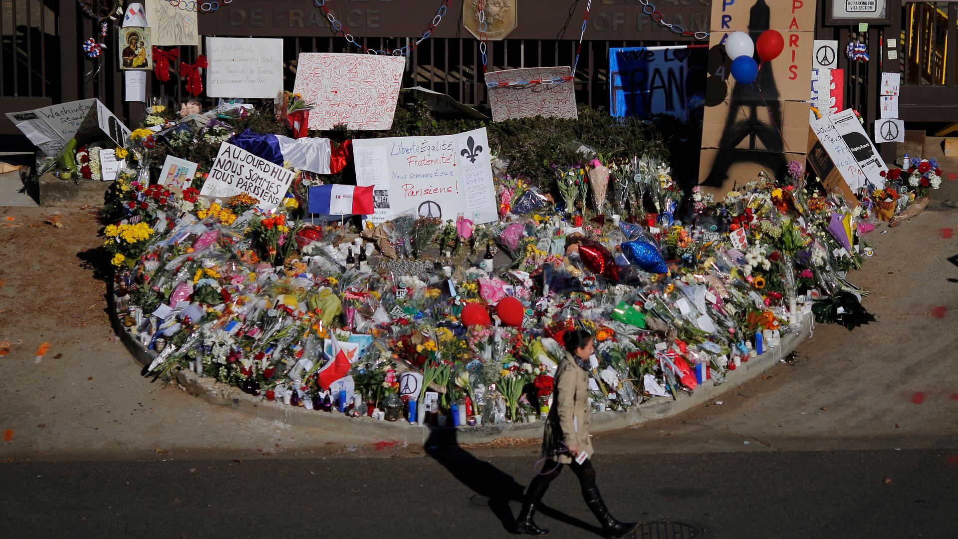 Flowers and expressions of sympathy, at the entrance to the French embassy in Washington.