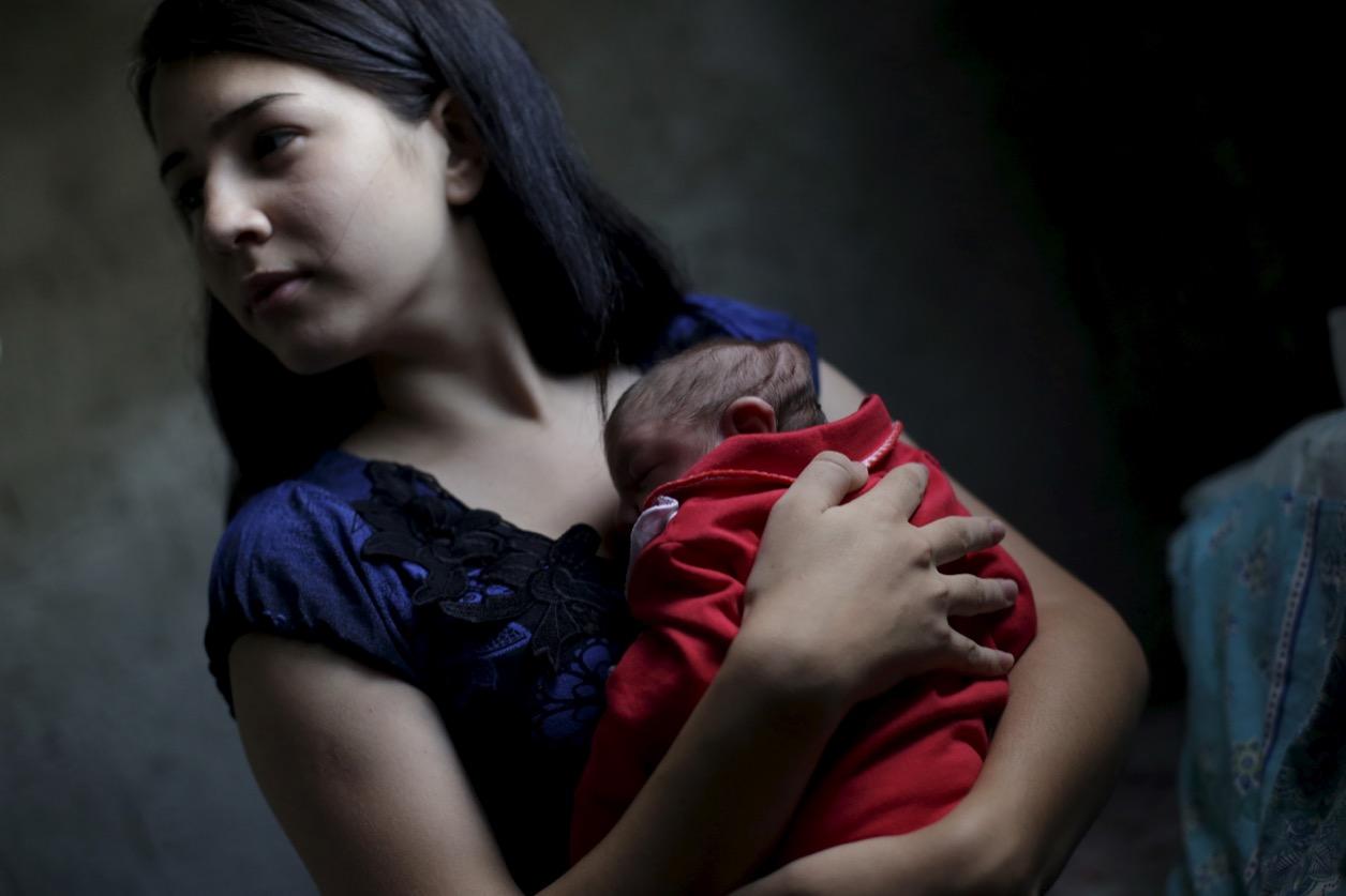Ianka Mikaelle Barbosa, 18, with Sophia, 18 days old, who was born with microcephaly, at her home in Campina Grande, Brazil.