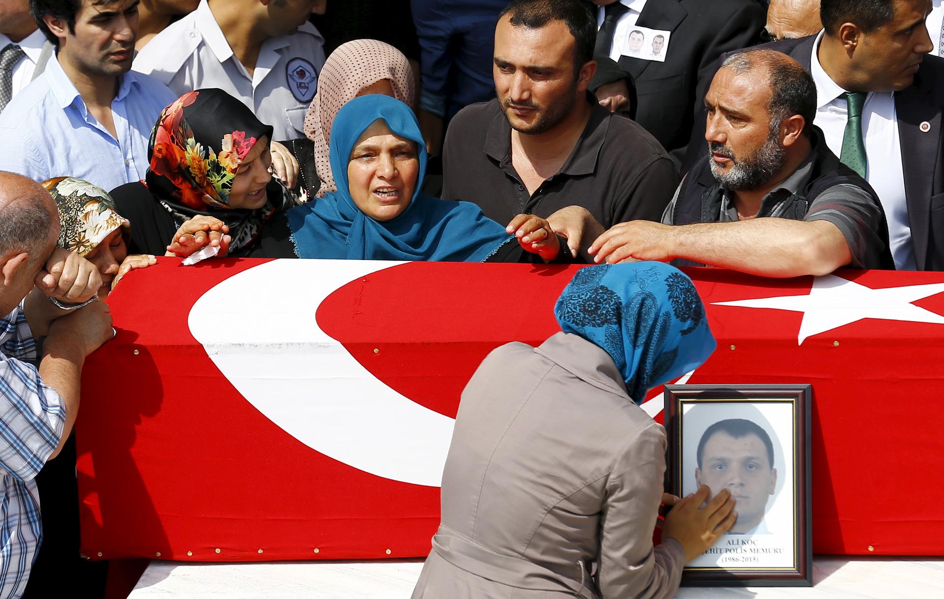 Family members mourn police officer, Ali Koc, one of the 14 police officers killed in a bombing blamed on PKK militants on Sept 8th 2015.