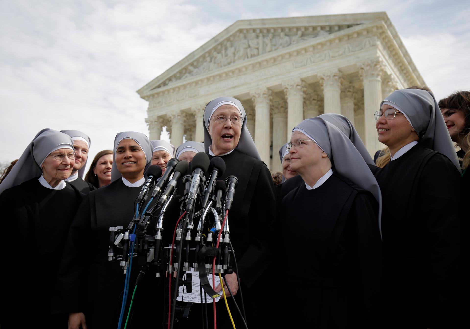 Sister Loraine McGuire with Little Sisters of the Poor speaks to the media after Zubik v. Burwell, an appeal brought by Christian groups demanding full exemption from the requirement to provide insurance covering contraception under the ACA.