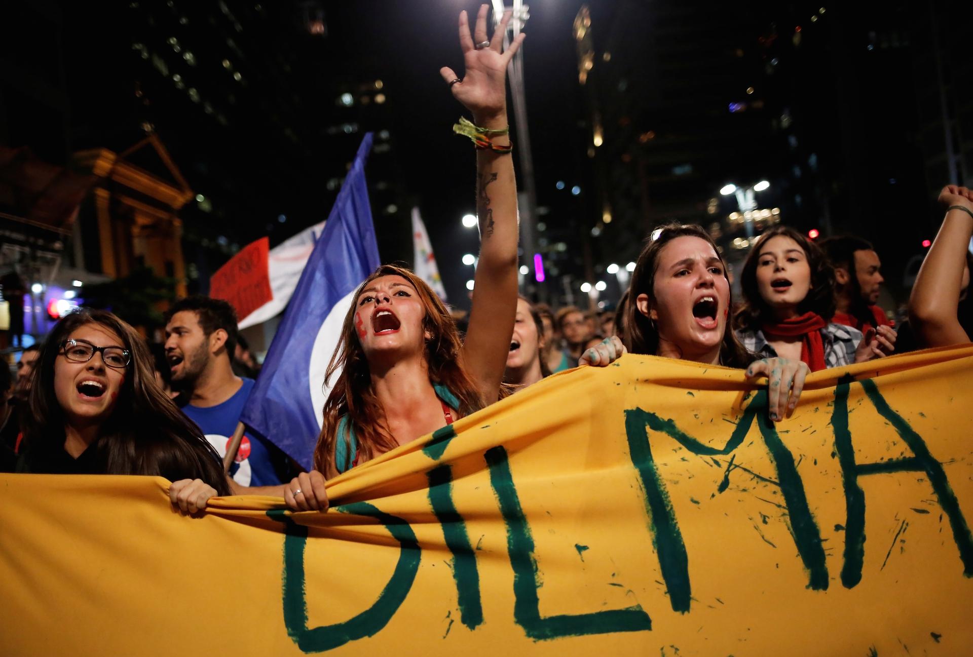 Women shout slogans during a protest against Brazil's interim President Michel Temer and in support of suspended President Dilma Rousseff on Paulista Avenue in Sao Paulo, Brazil, on May 17.