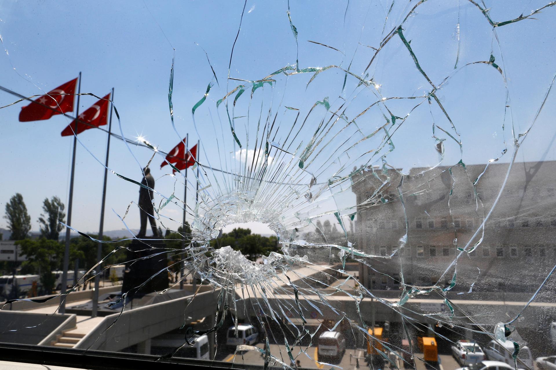 A damaged window is pictured at the police headquarters in Ankara, Turkey, July 18, 2016.
