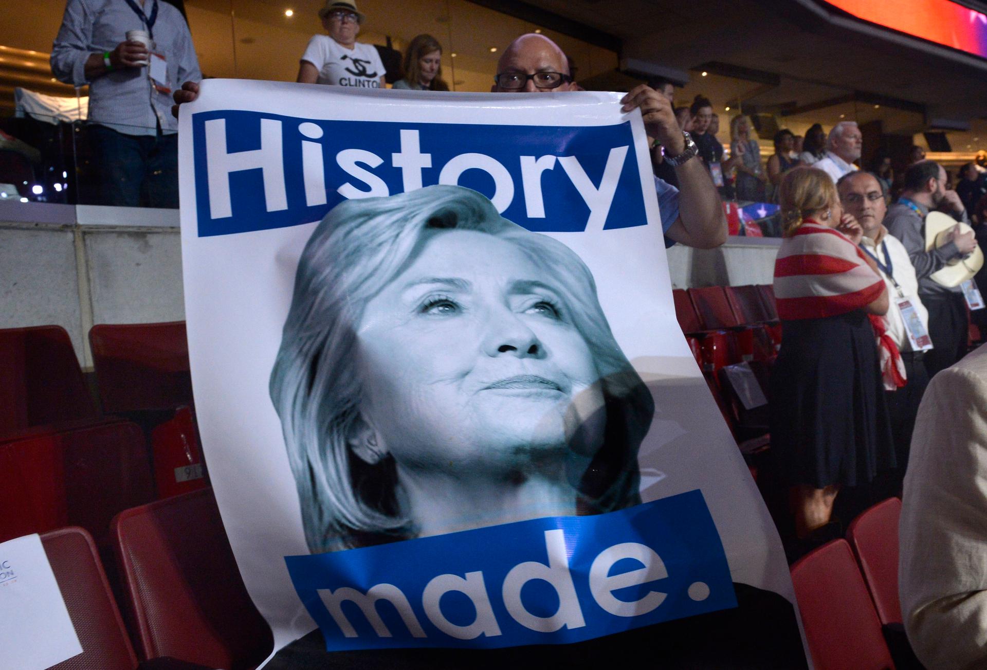 A delegate holds a Hillary Clinton poster at the Democratic National Convention in Philadelphia, Pennsylvania. U.S. July 28, 2016.
