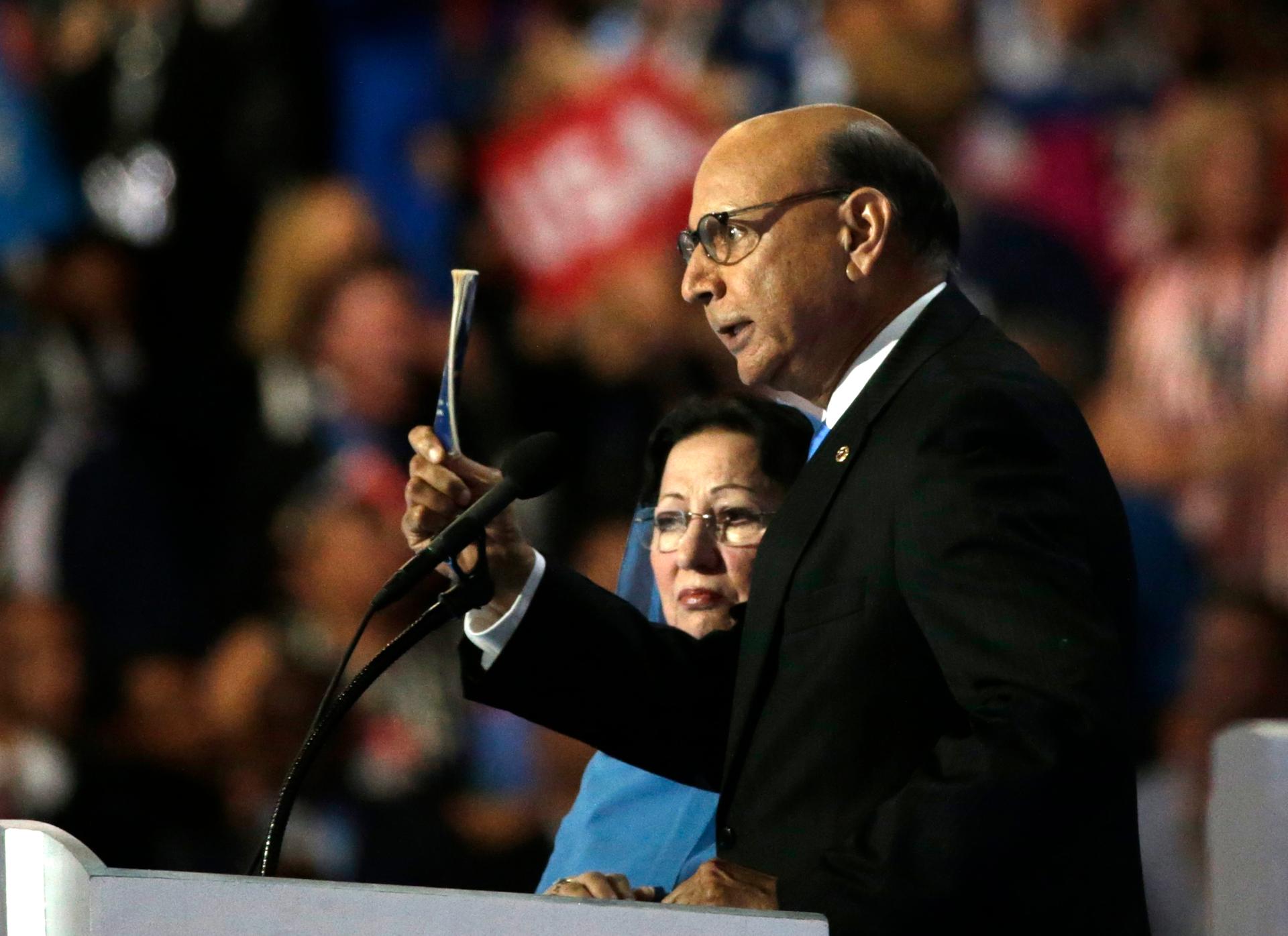 Khizr Khan, who's son Humayun was killed serving in the US Army ten years after September 11, 2001, challenges Republican presidential nominee Donald Trump to read his copy of the U.S. Constitution at the DNC, July 28, 2016.