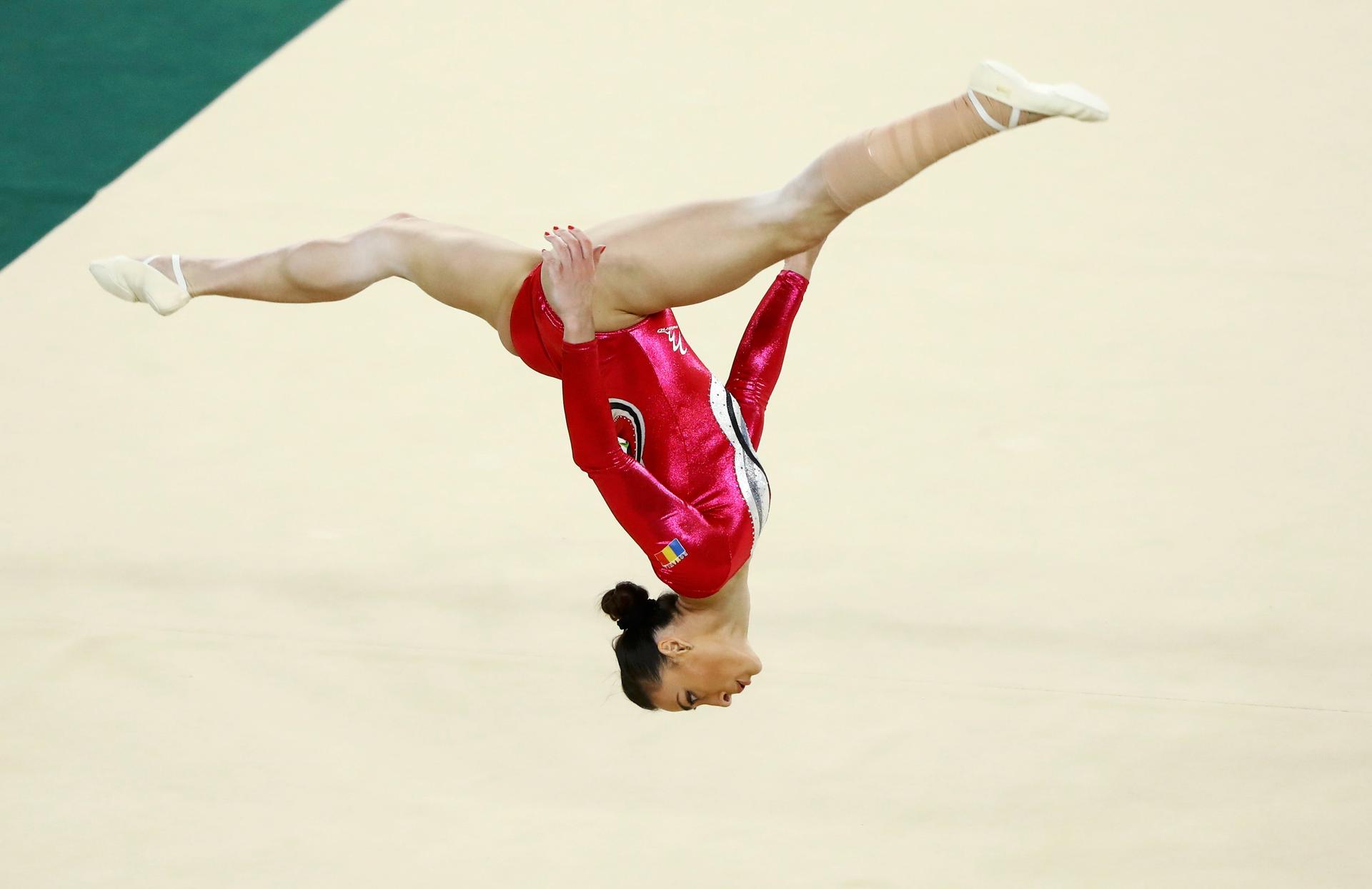 Catalina Ponor (ROU) of Romania competes on the floor during the women's qualifications.