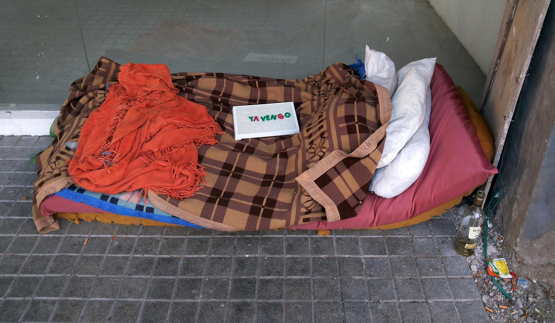 A make-shift bed of a homeless person, with a sign on top that reads "I'll be right back," in Buenos Aires, Argentina, on Sept. 11.