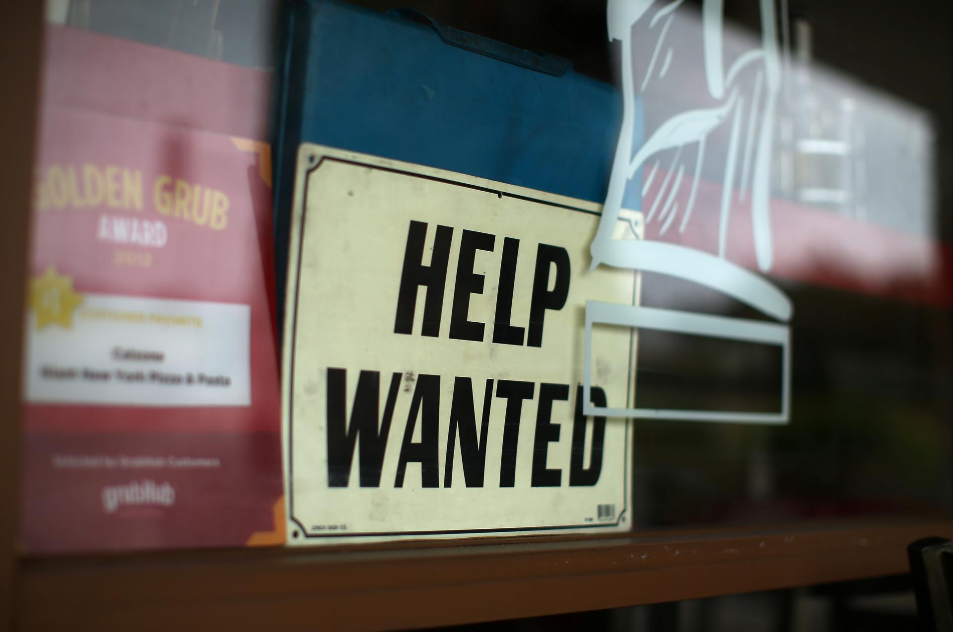 Help wanted sign on restaurant window
