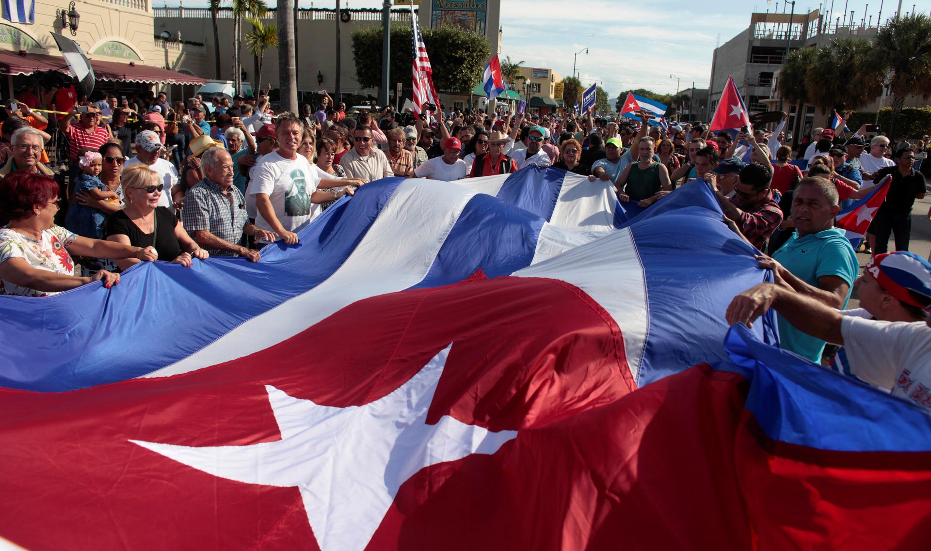 People celebrate after the announcement of the death of Cuban revolutionary leader Fidel Castro in the Little Havana district of Miami, Florida, U.S., November 26, 2016.