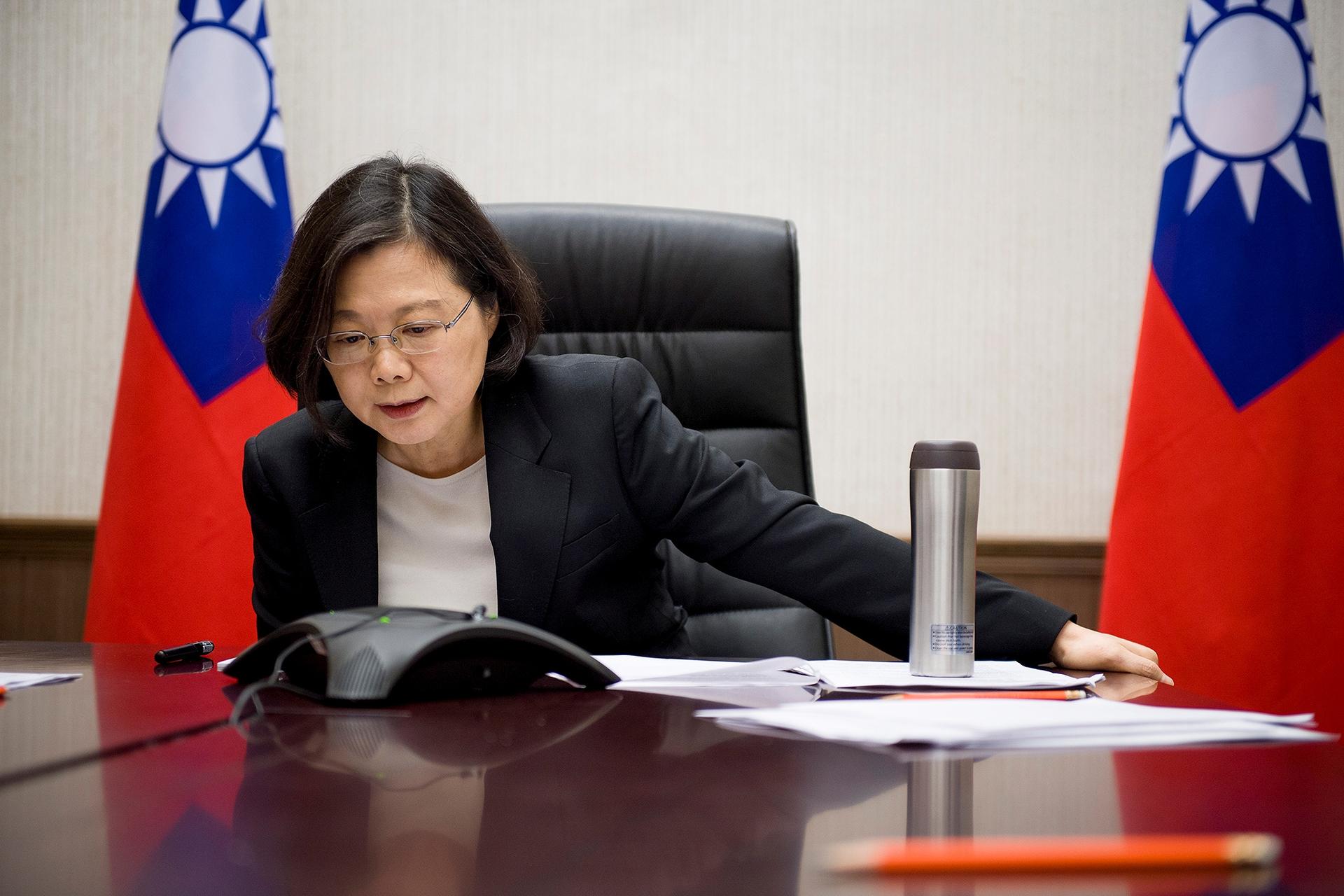 Taiwan's President Tsai Ing-wen speaks on the phone with US President-elect Donald Trump at her office in Taipei, Taiwan, in this handout photo. 