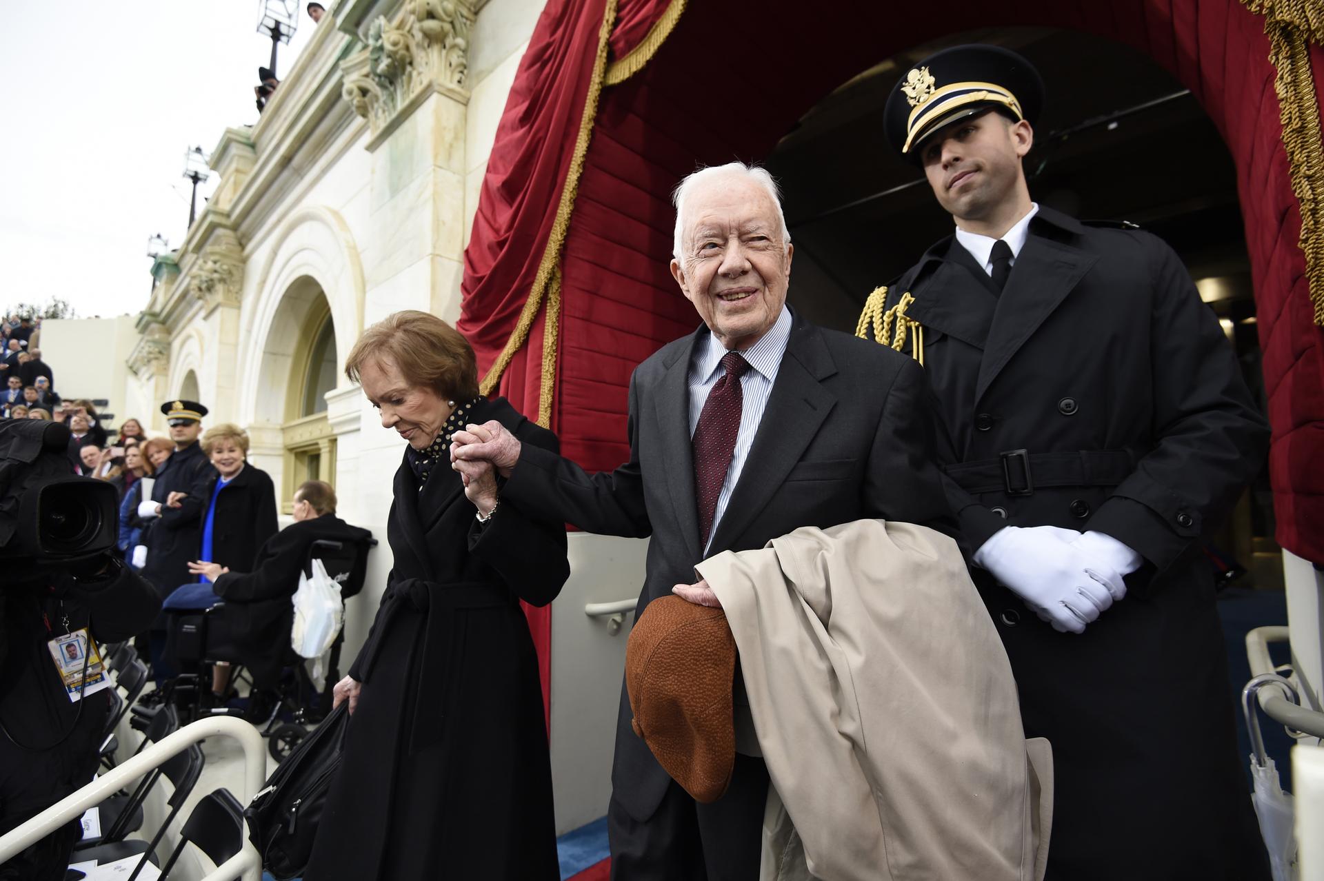 Former US President Jimmy Carter and First Lady Rosalynn Carter arrive for the Presidential Inauguration of Trump 