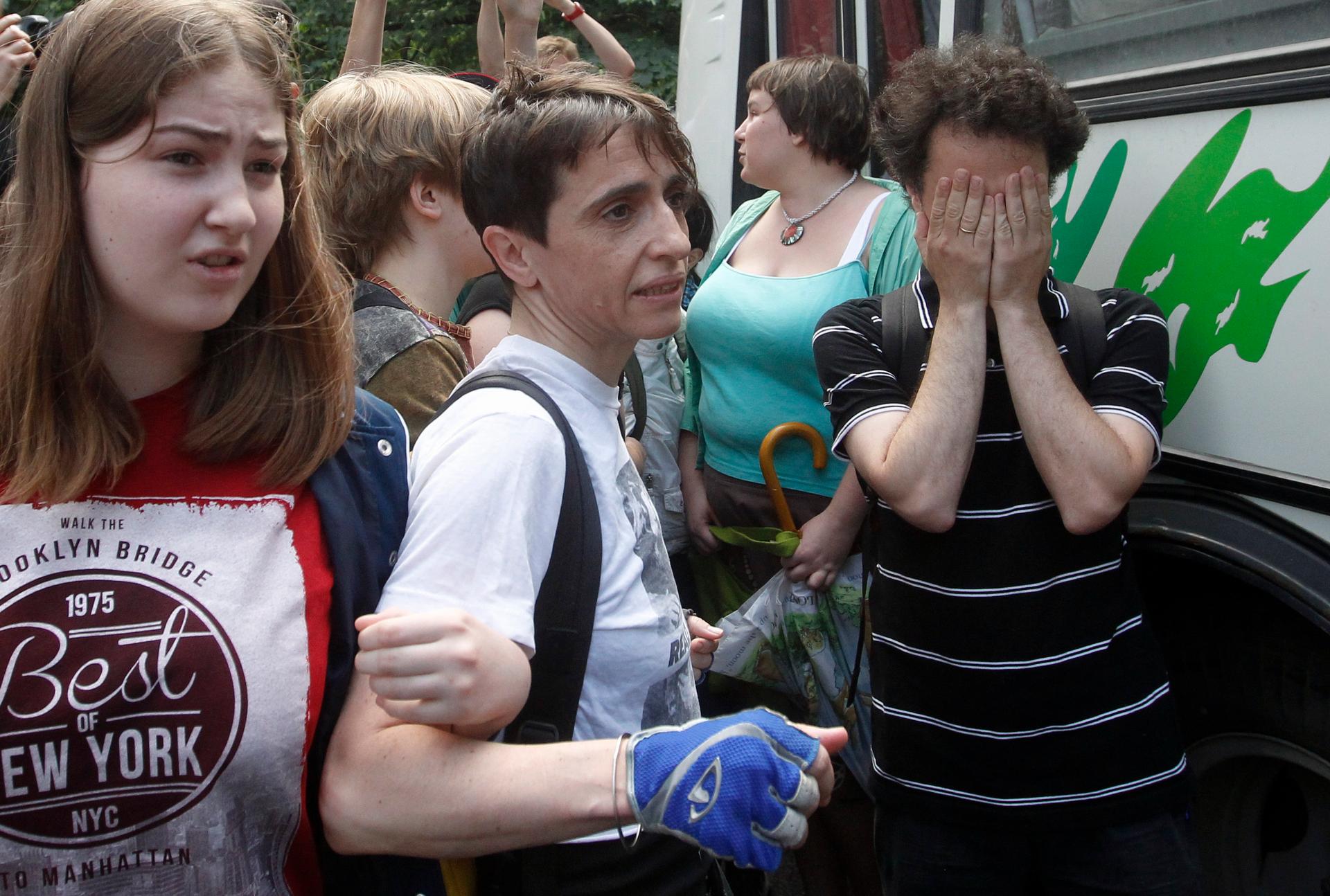 Russia-born U.S. journalist Masha Gessen (center) in a 2013 protest in Moscow against a proposed new law that would ban gay rights rallies. 