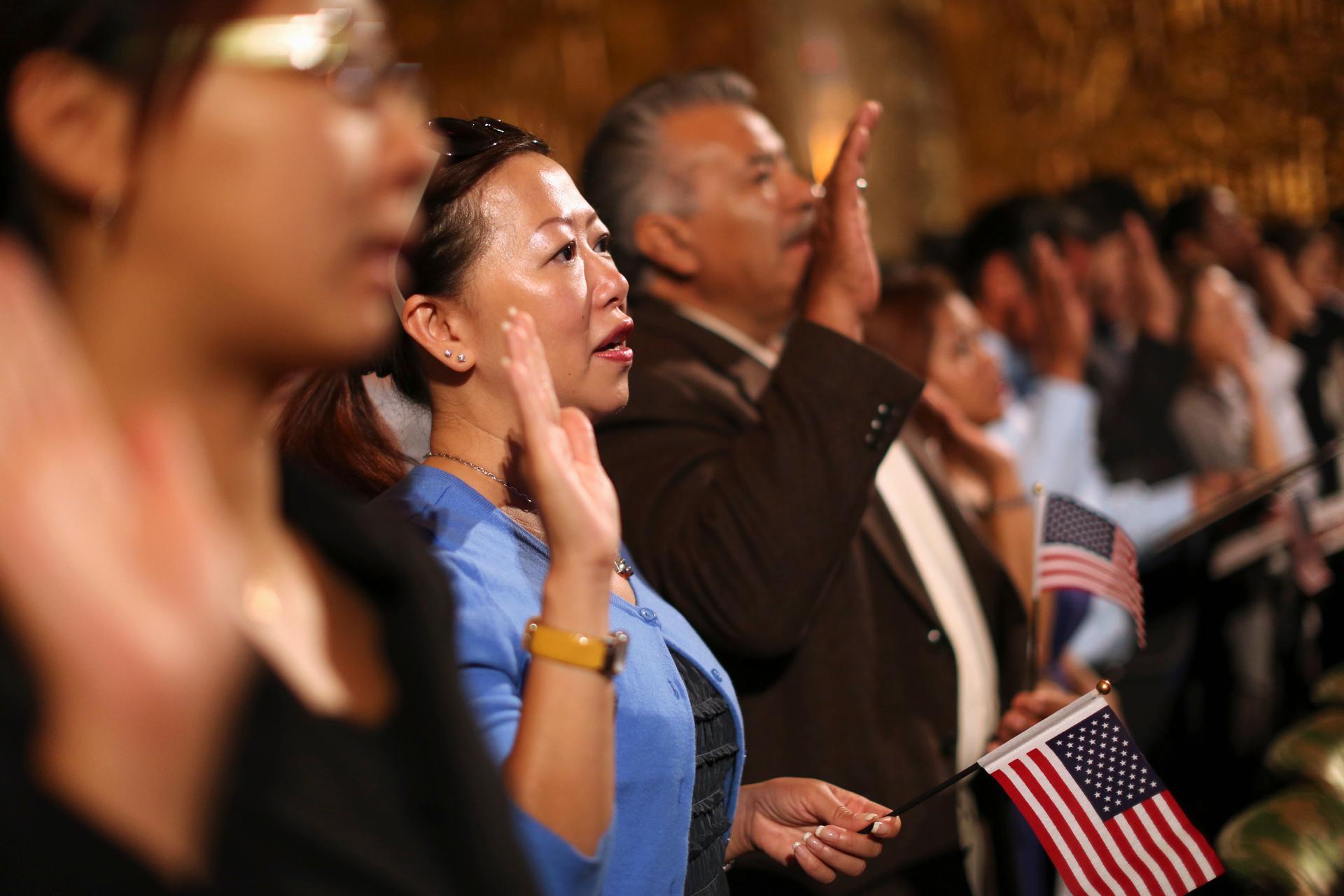 New citizens are naturalized during a ceremony in Oakland, California, on August 13, 2013. 