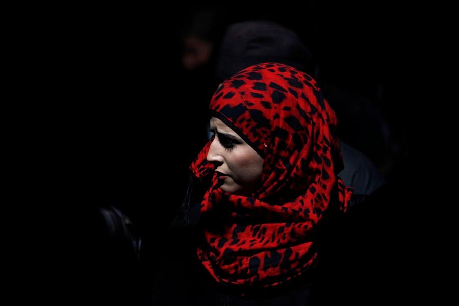 Religious headscarves, like the one this Palestinian woman is wearing, can be prohibited at the workplace in Europe, the European Court of Justice ruled.
