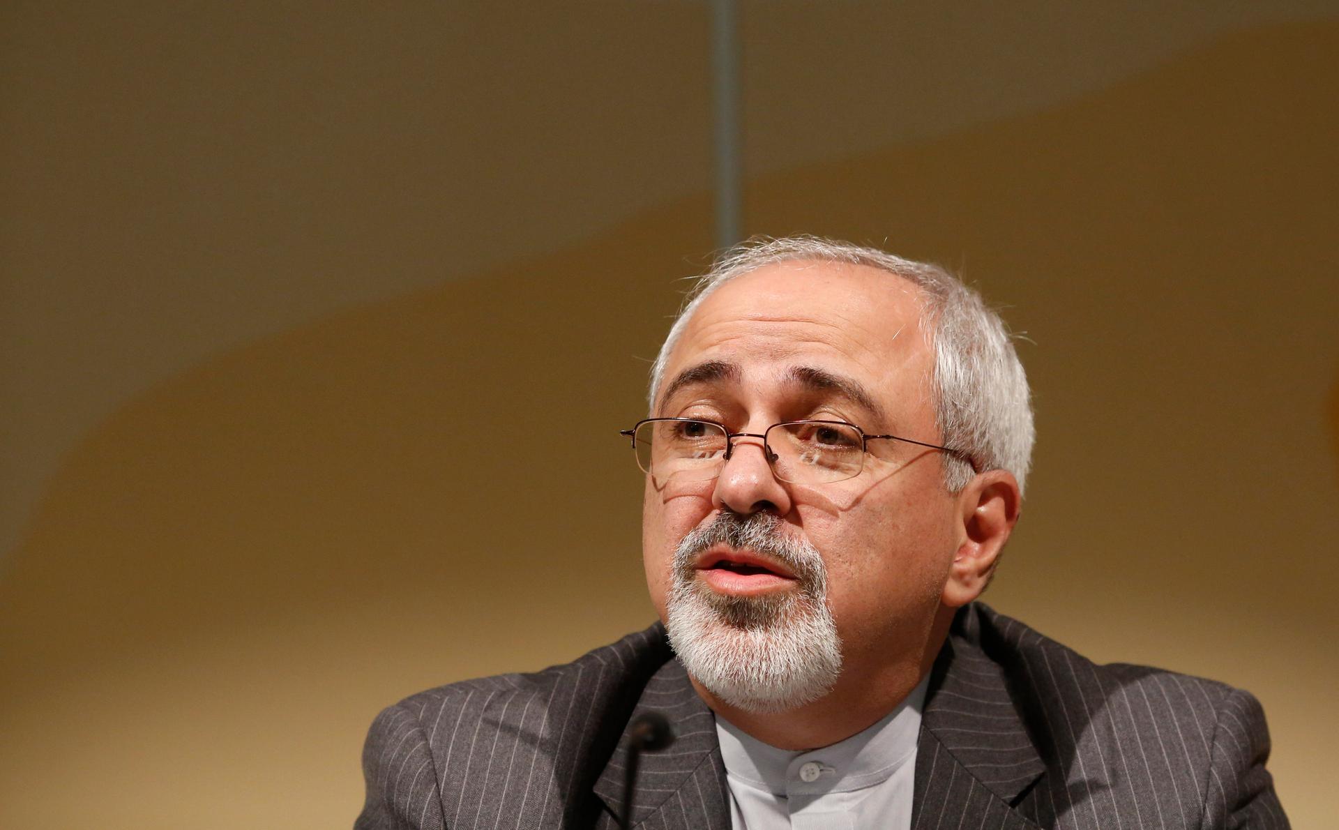 Iranian Foreign Minister Mohammad Javad Zarif addresses a news conference in Geneva