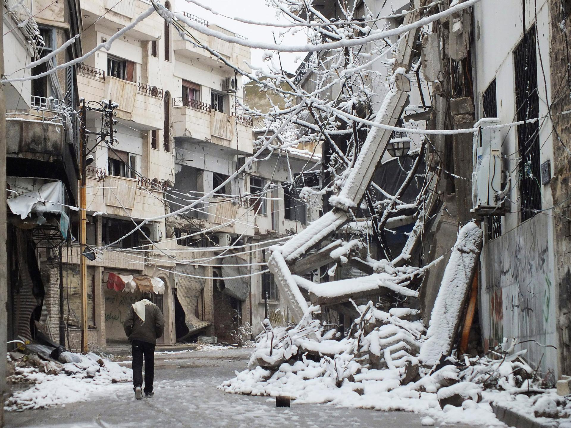 Buildings covered with snow in Homs