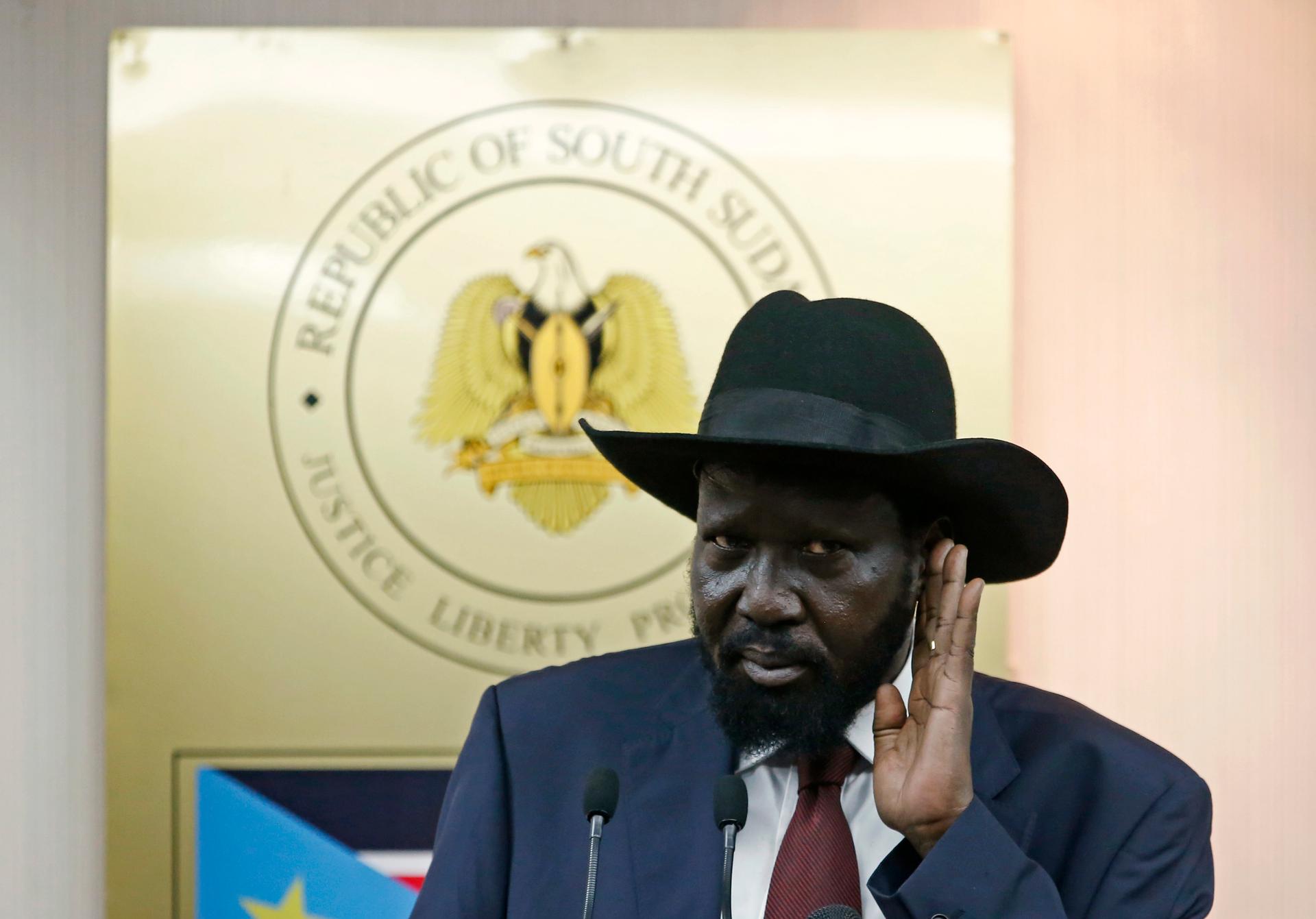 South Sudan's President, Salva Kiir, listens to a question during a news conference, Wednesday. He's accused of not listening to critics. 