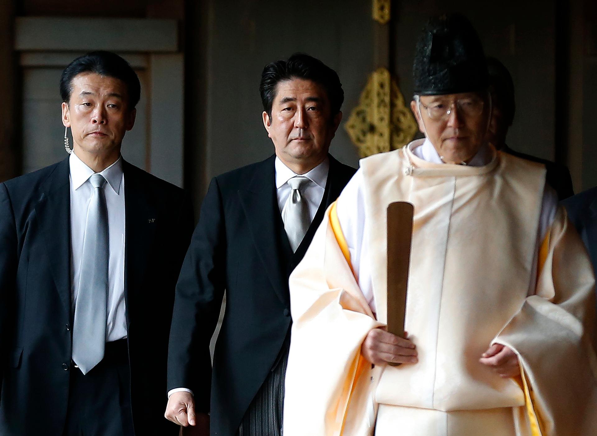Japanese Prime Minister Shinzo Abe visits a Tokyo shrine for war dead