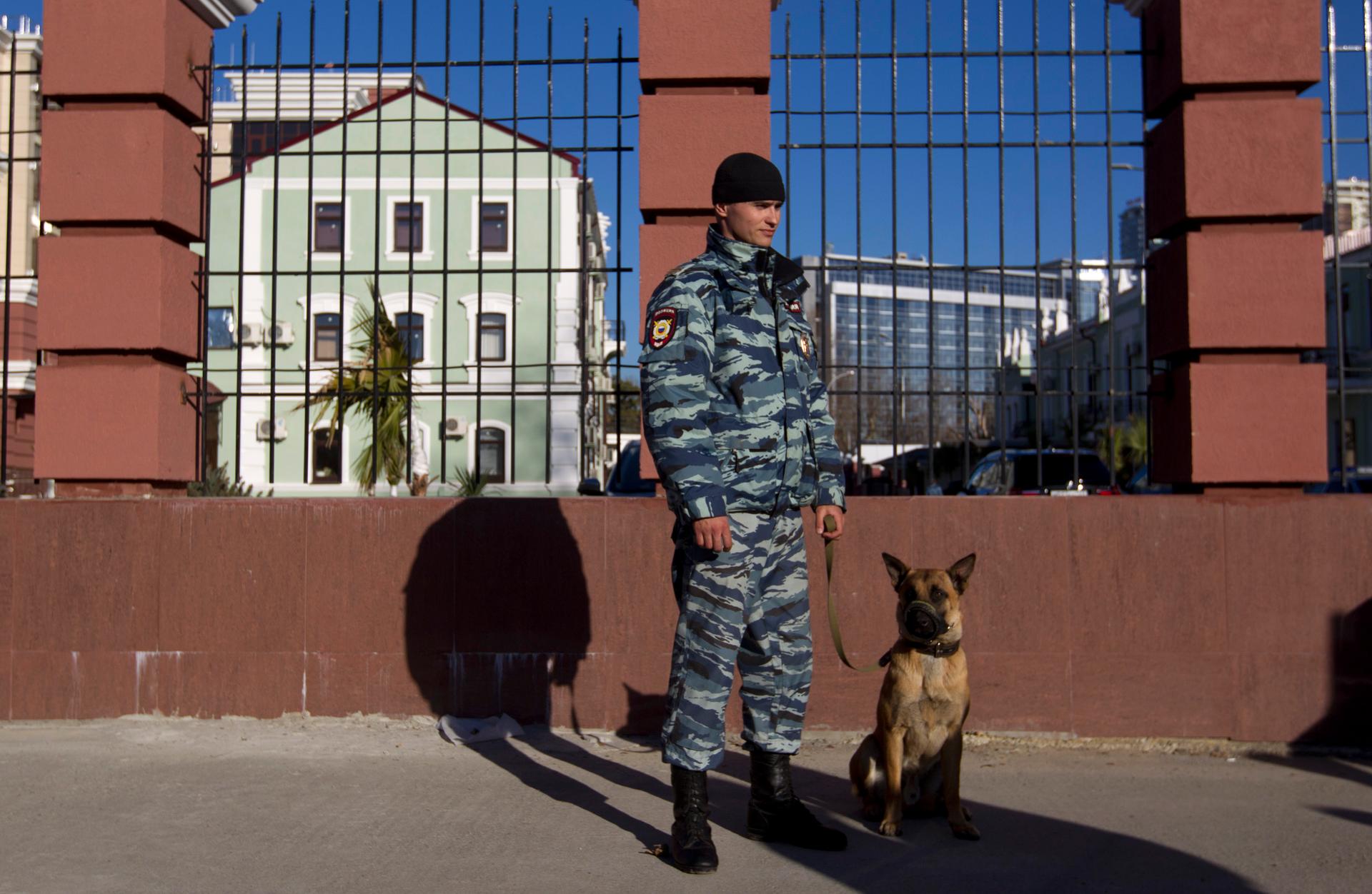 One of the roughly 40,000 Russian police and security agents on duty in Sochi.